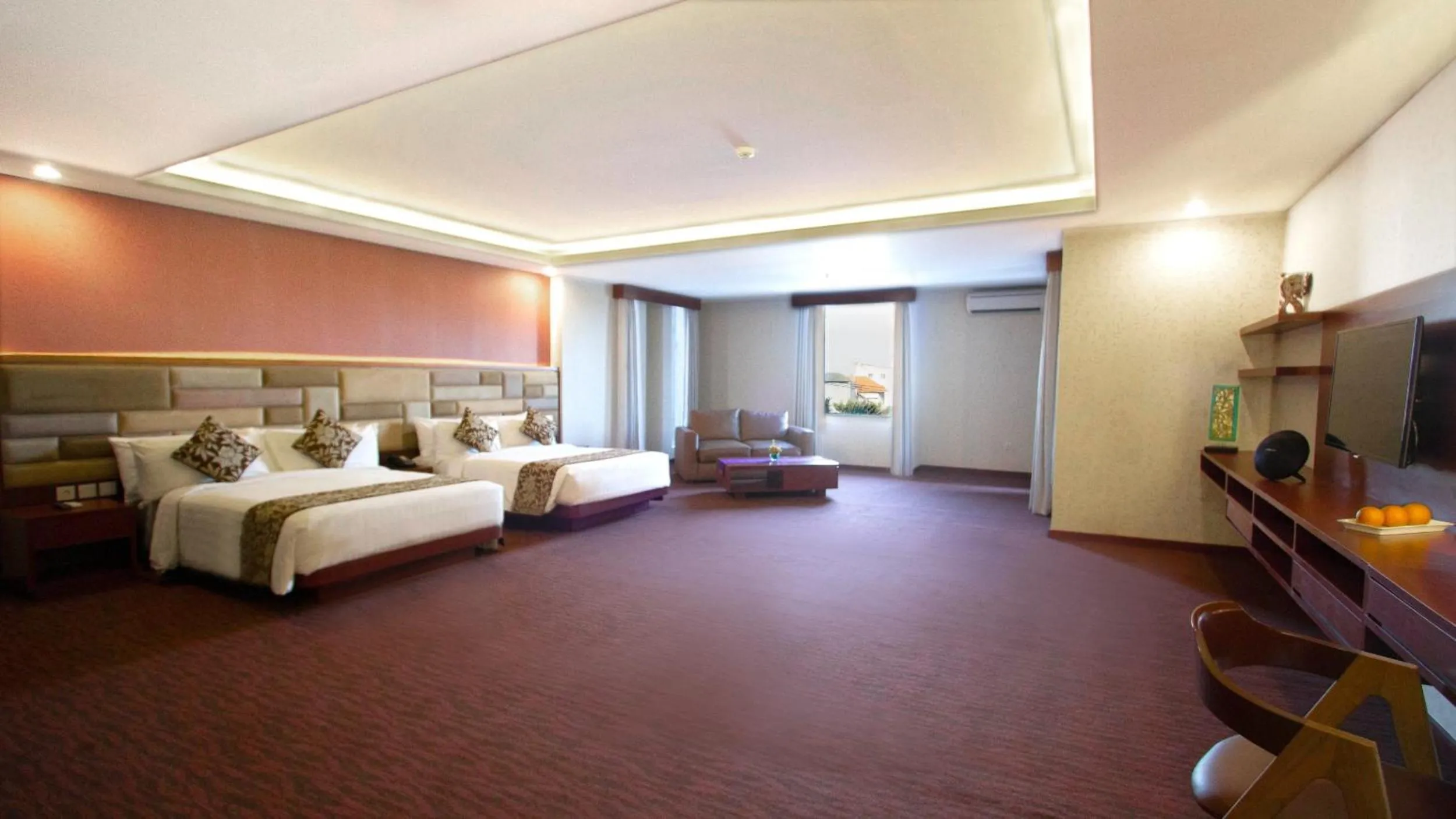 Photo of the whole room, Bed in Quest San Denpasar by ASTON