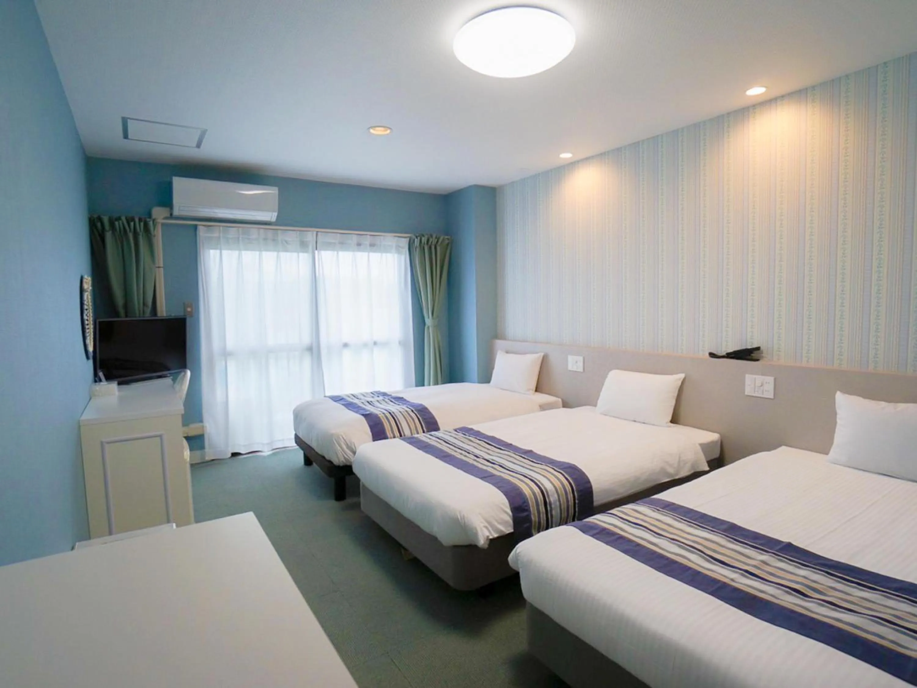 Bed in Hotel Caretta