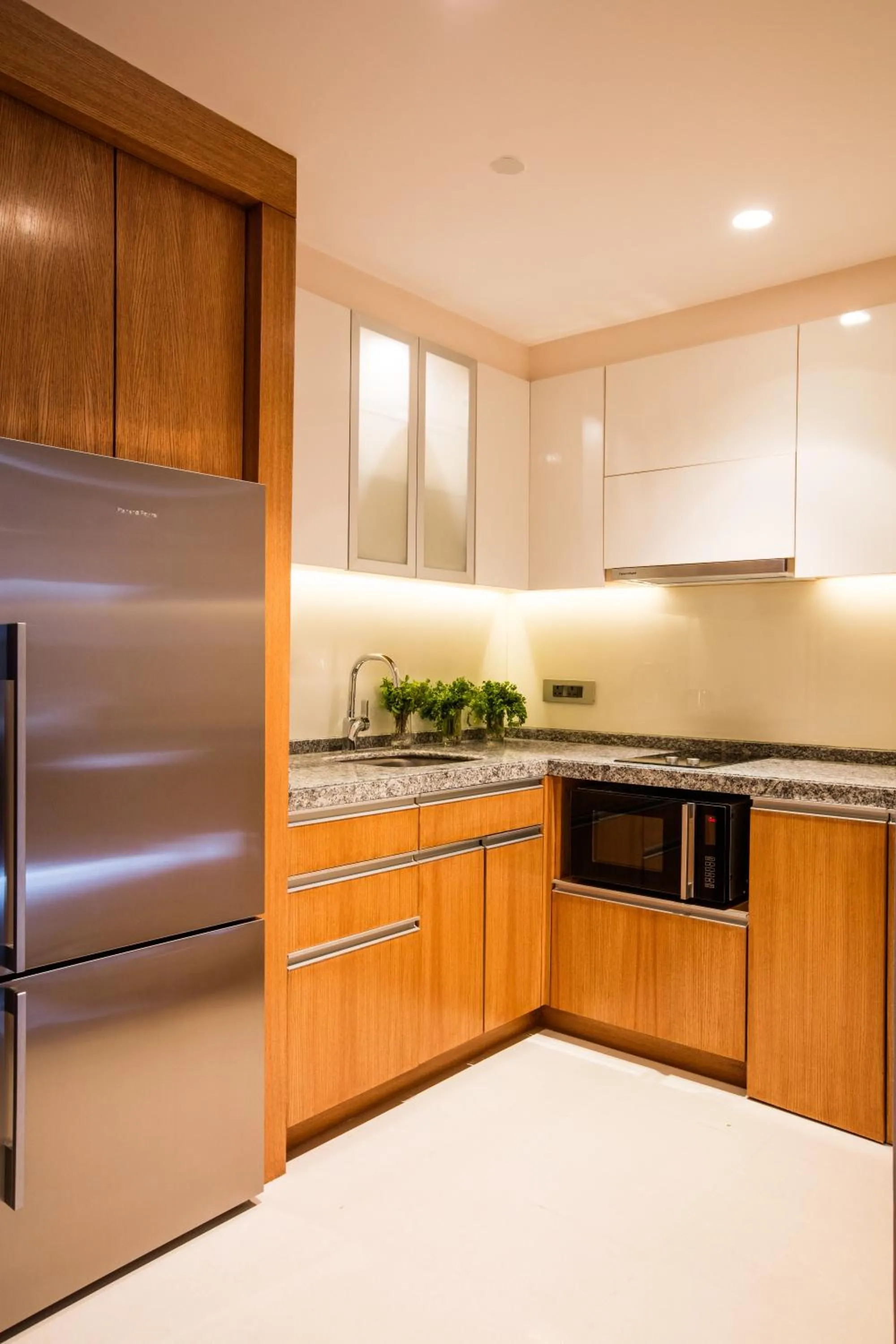 Kitchen or kitchenette in Oakwood Residence Kapil Hyderabad