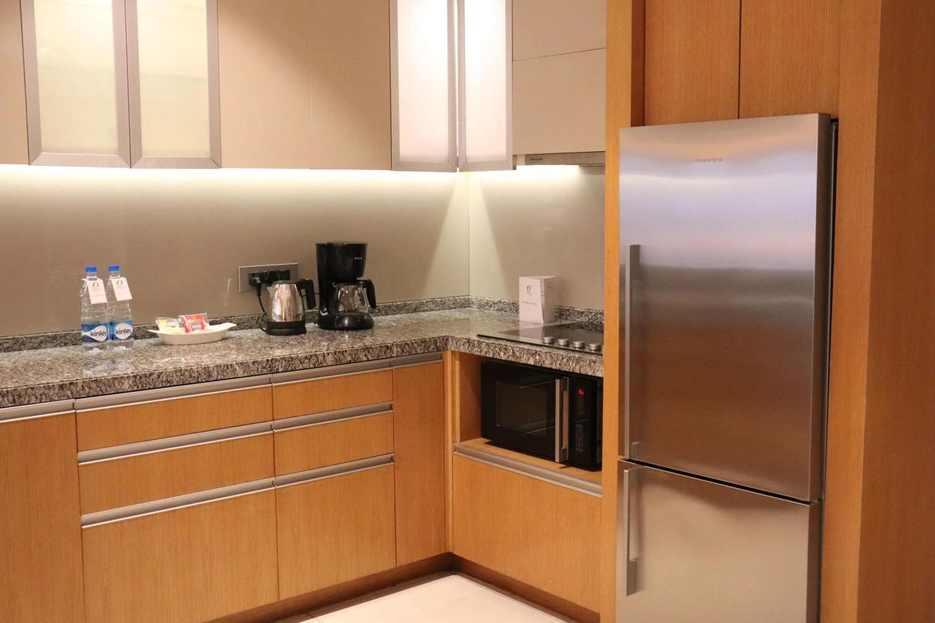 Kitchen or kitchenette in Oakwood Residence Kapil Hyderabad