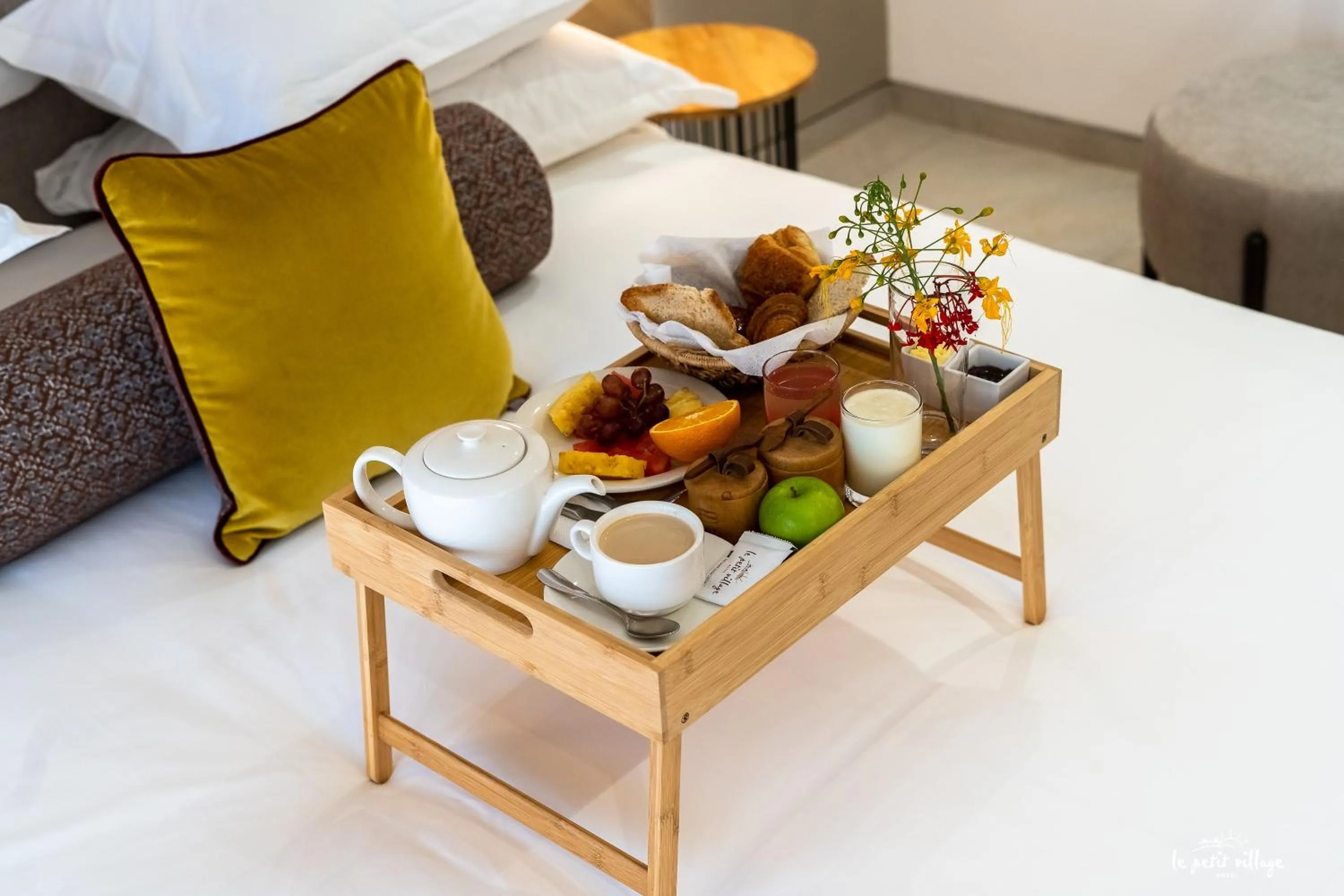 Breakfast, Bed in Le Petit Village Boutique Hotel & Spa