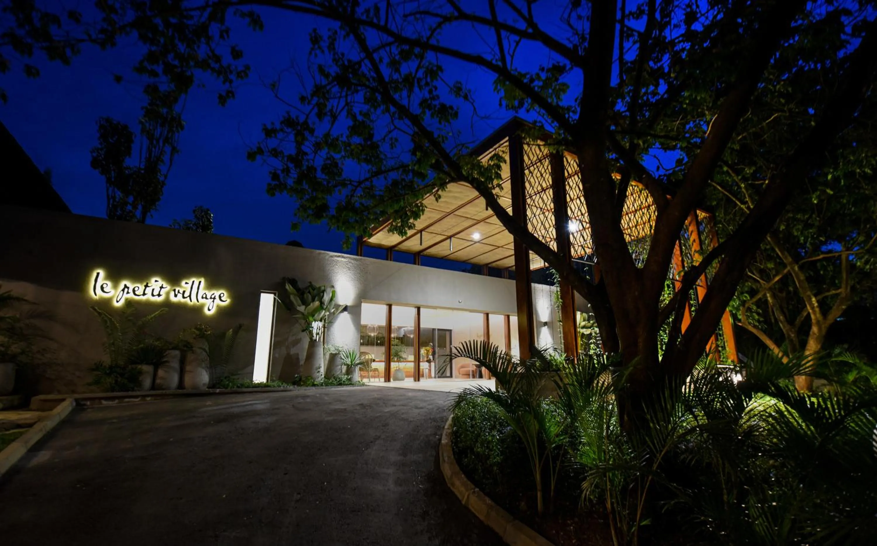 Property building in Le Petit Village Boutique Hotel & Spa