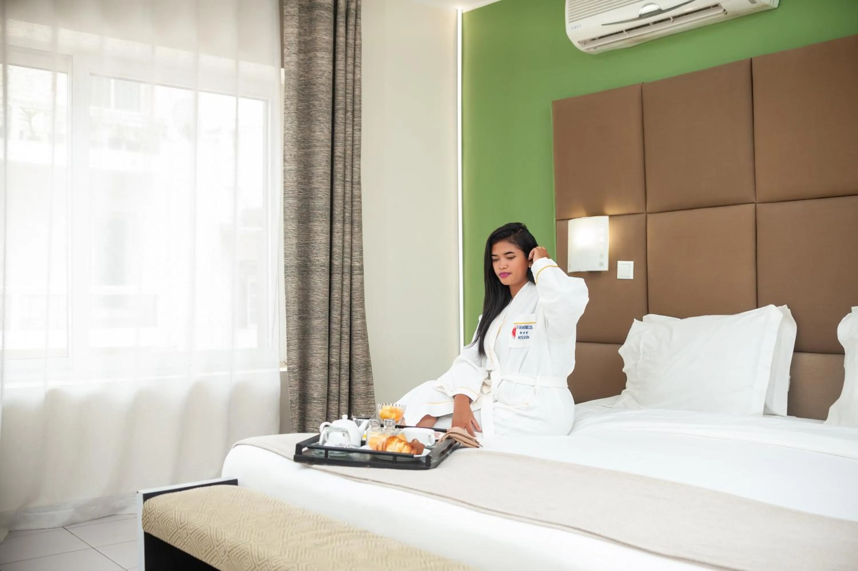 Bed in Le Grand Mellis Hôtel & Spa