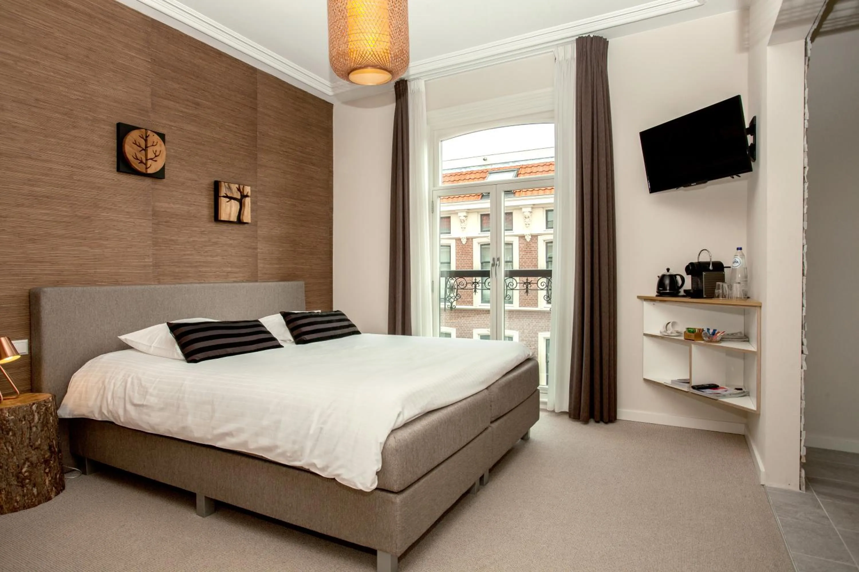 Bed in La Paulowna Boutique Hotel