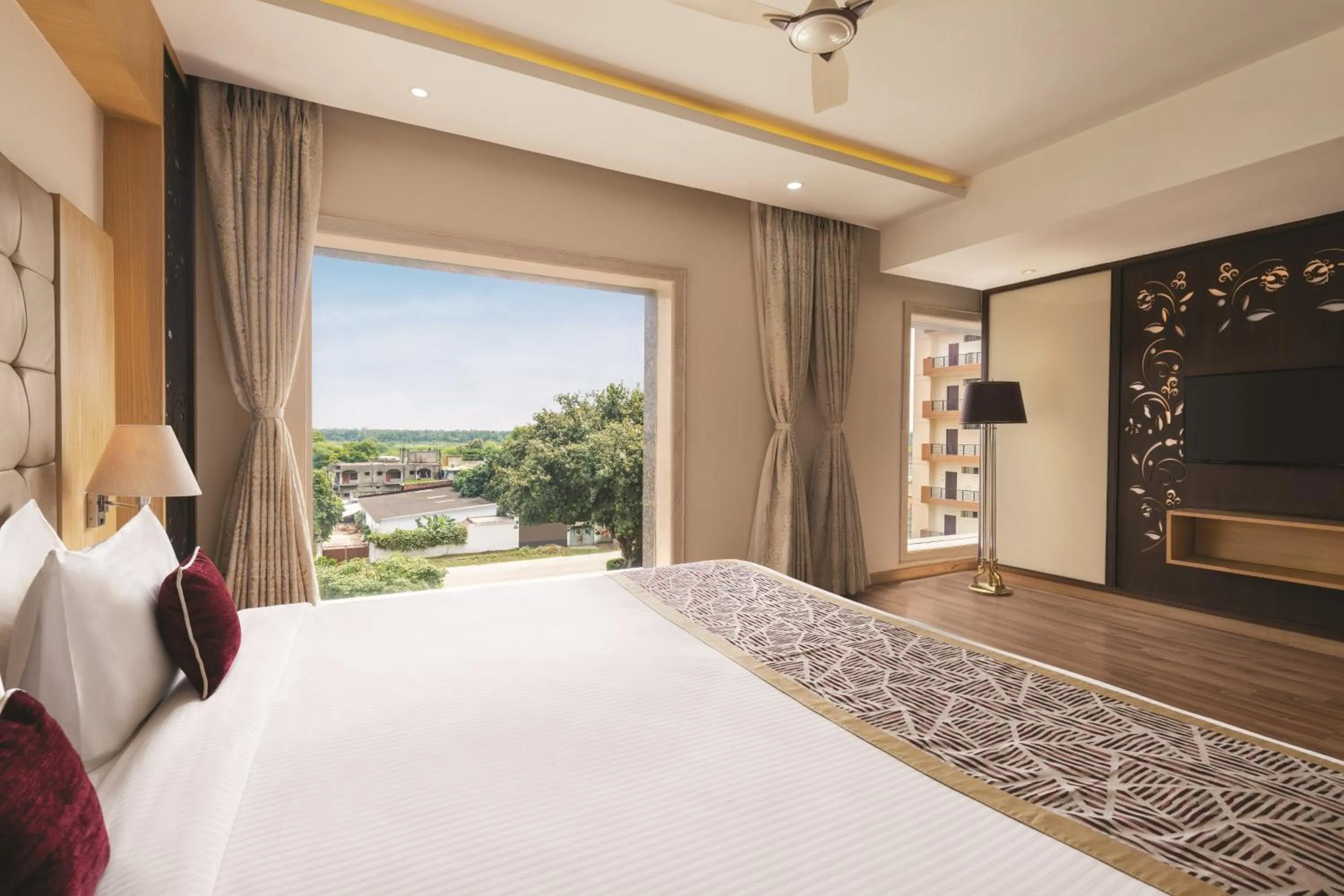 View (from property/room), Bed in Ramada by Wyndham Varanasi Katesar
