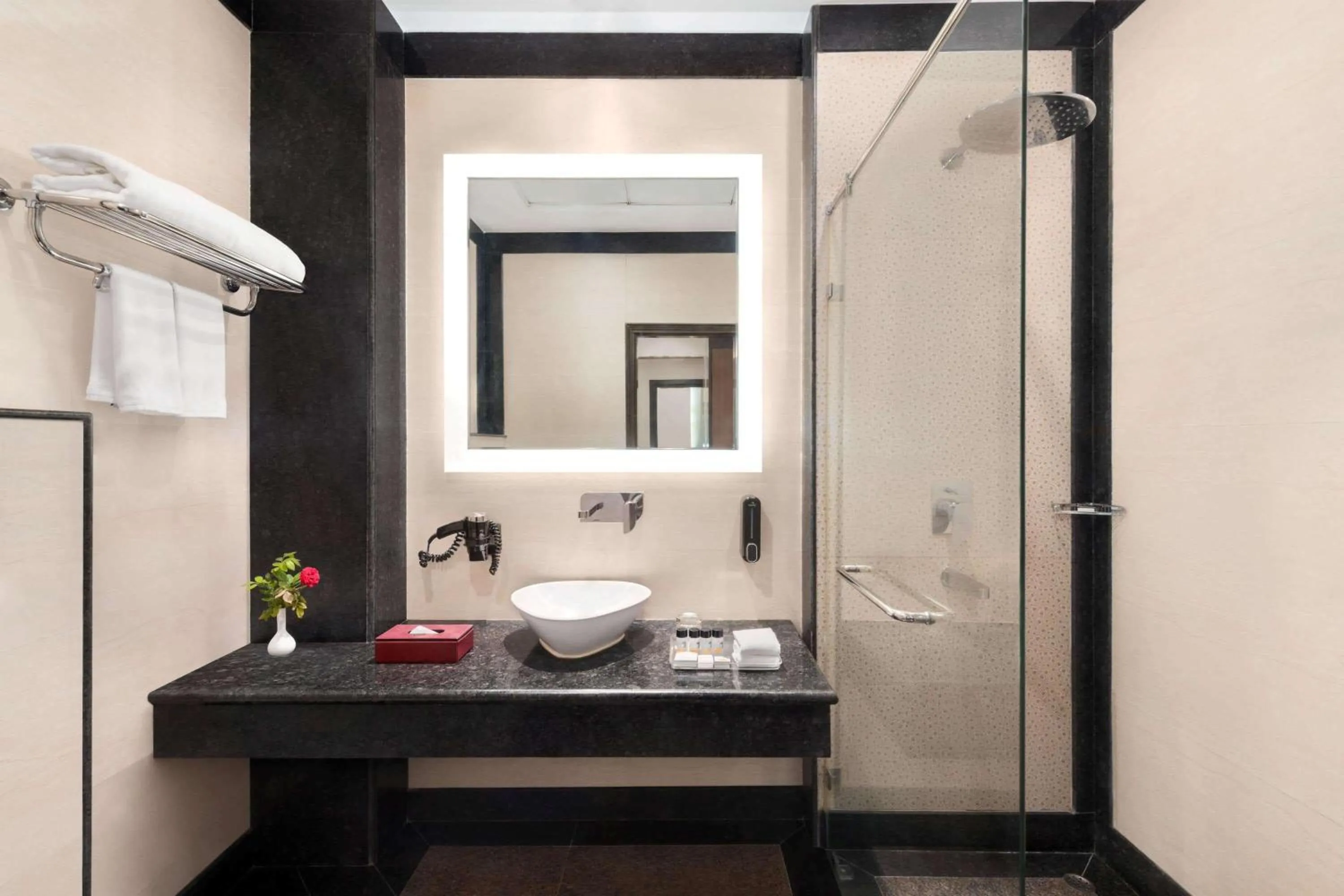 Bathroom, Bed in Ramada by Wyndham Varanasi Katesar