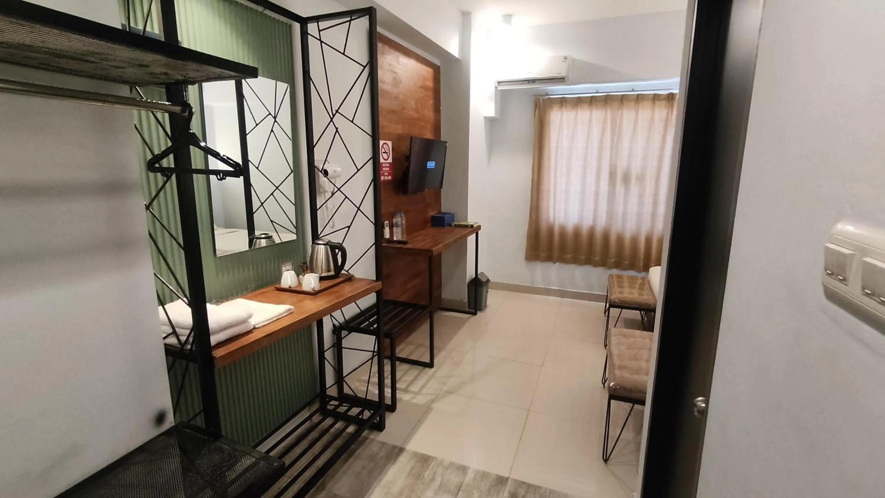 Bedroom, Bed in De La Charis Hotel by Waringin Hospitality