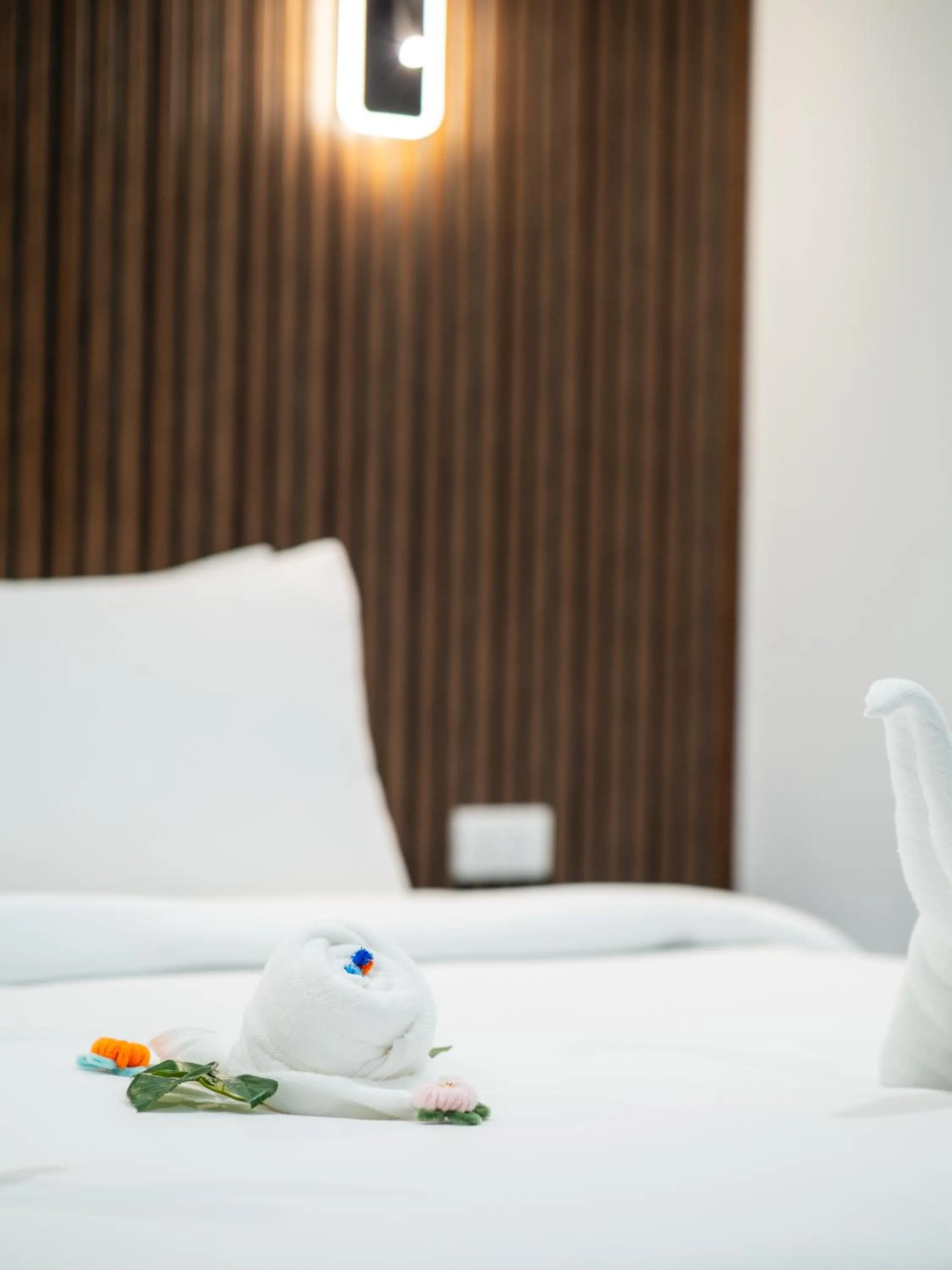 Bed in Samutprakarn Hotel