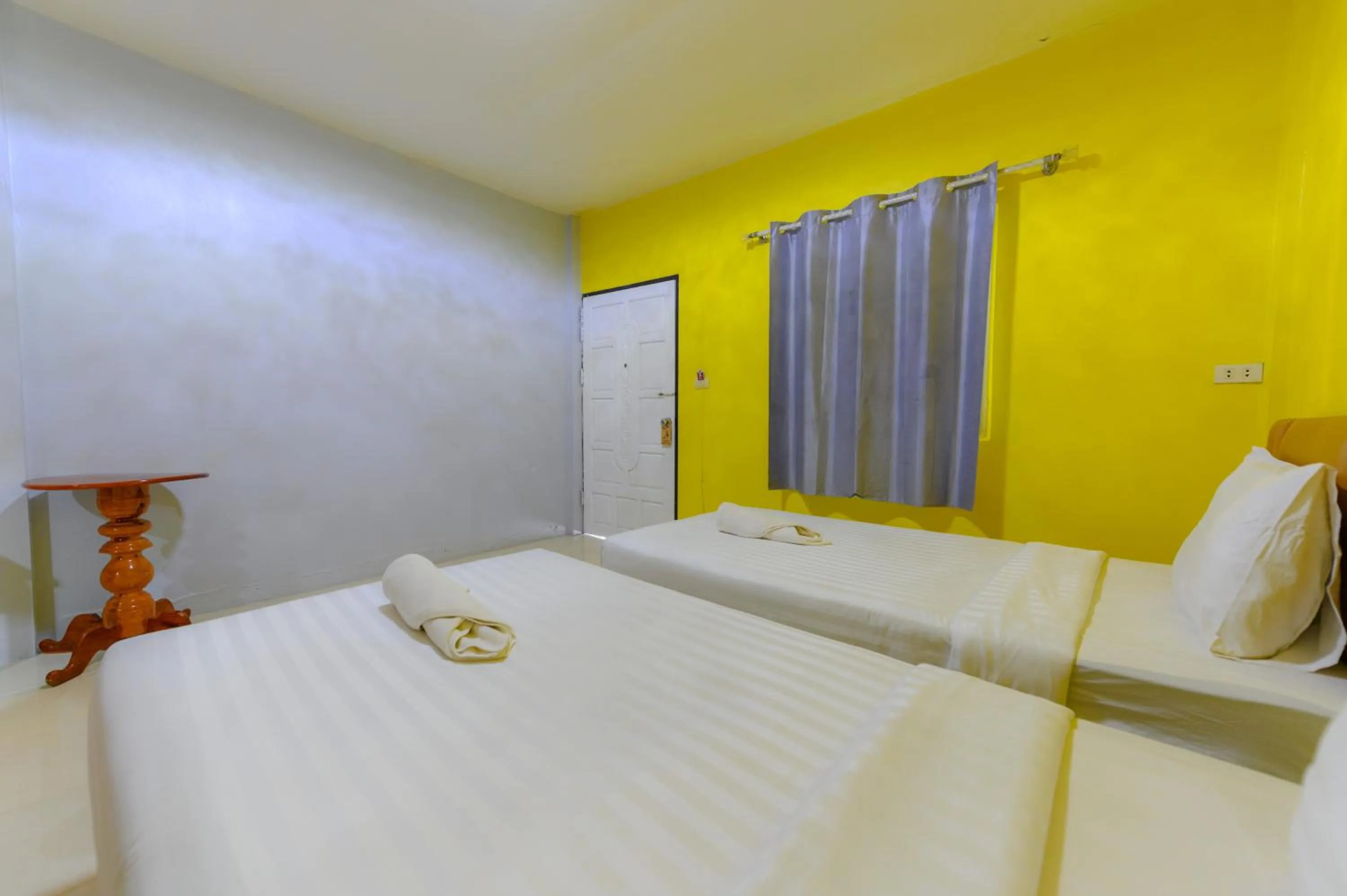 Bed in Kongkhamkoon Hotel