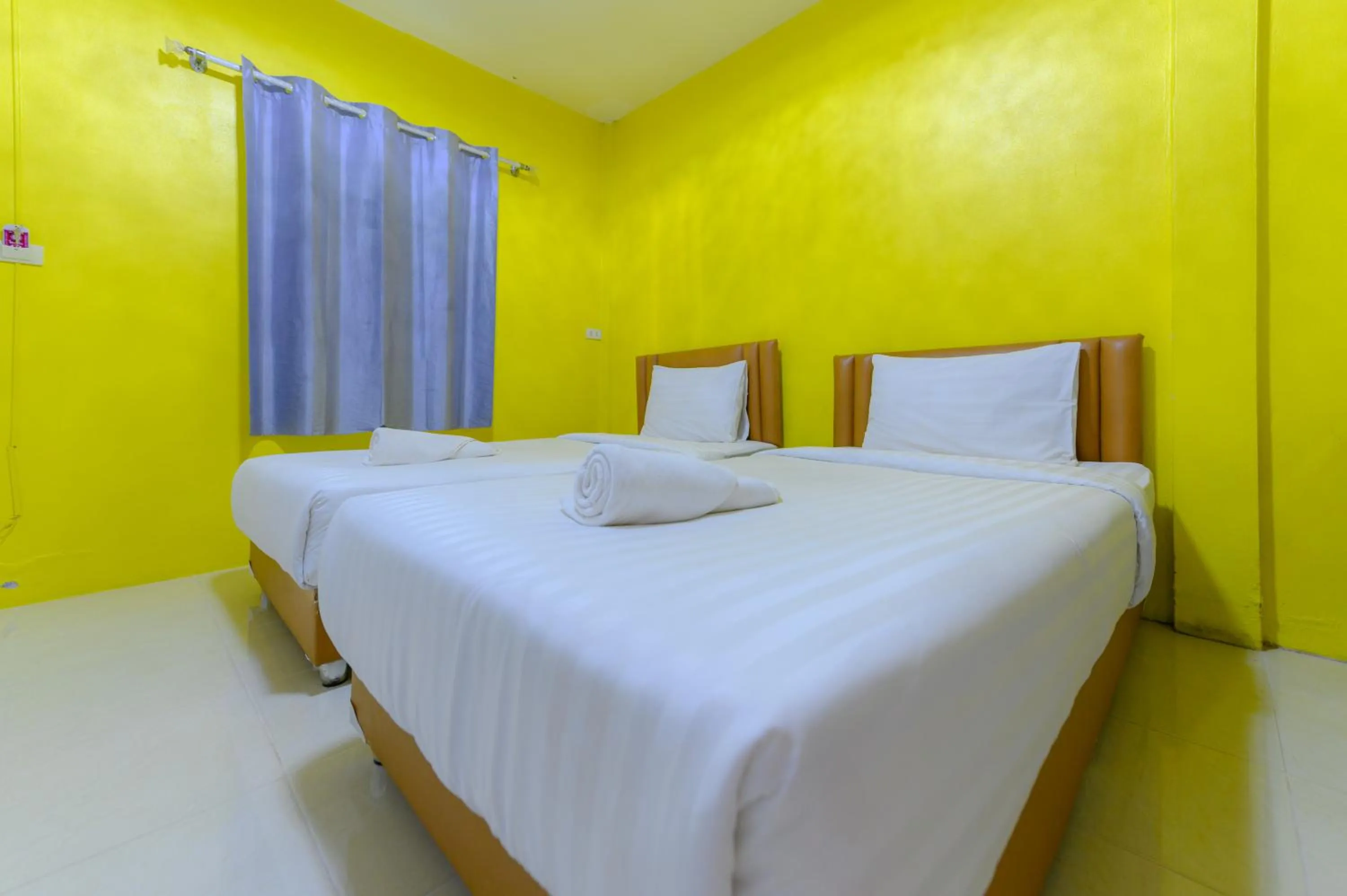 Bed in Kongkhamkoon Hotel