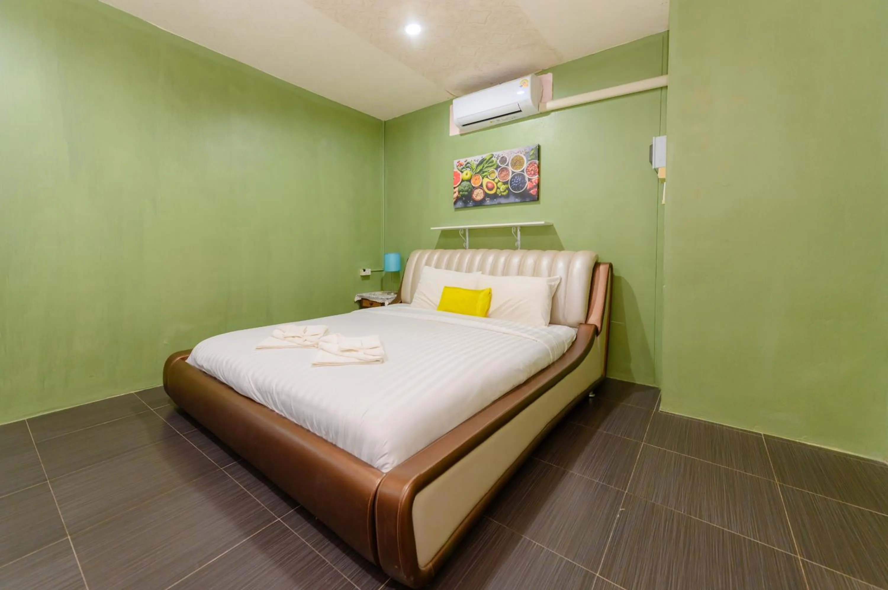 Bed in Kongkhamkoon Hotel