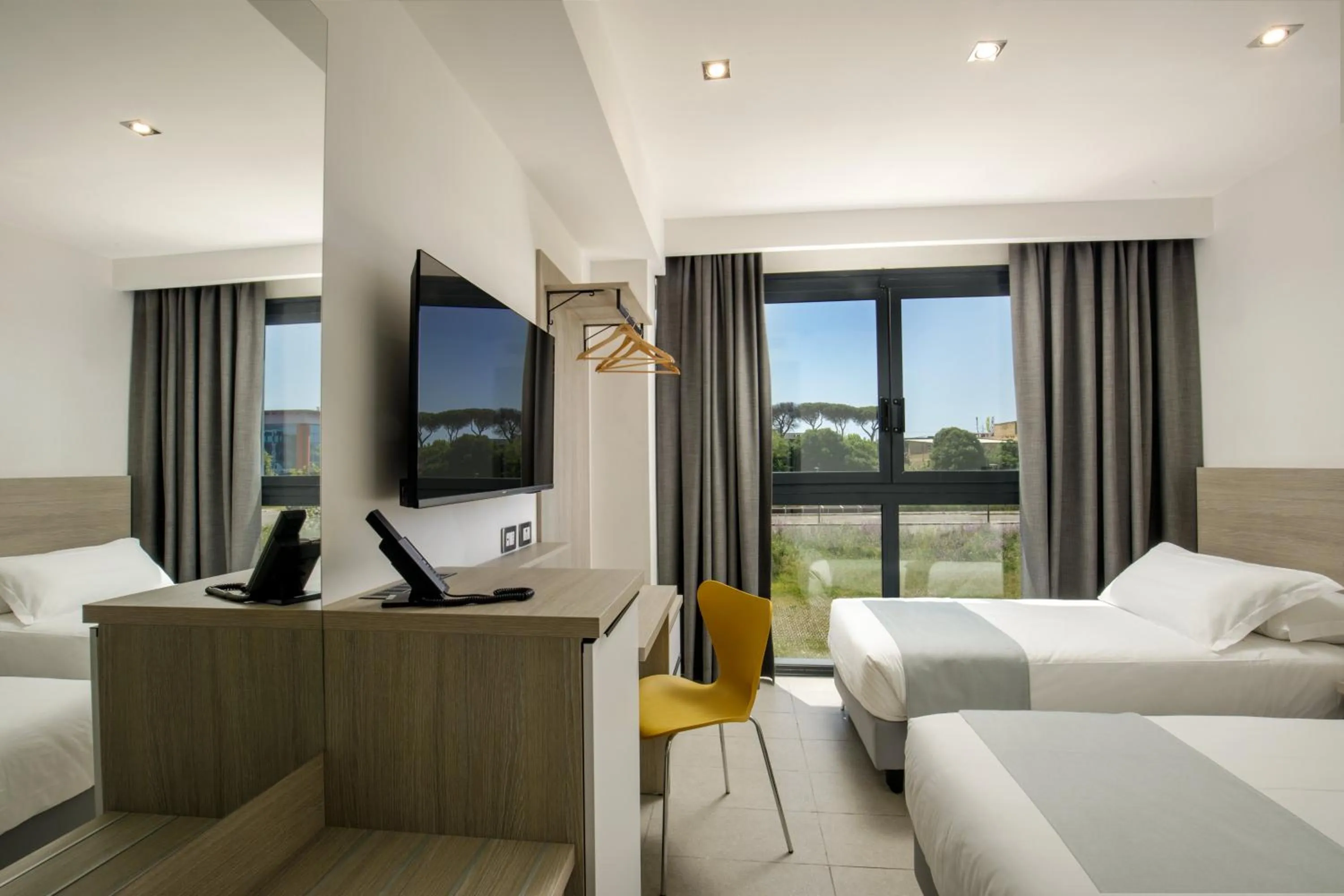 Bed in Simon Hotel Aprilia