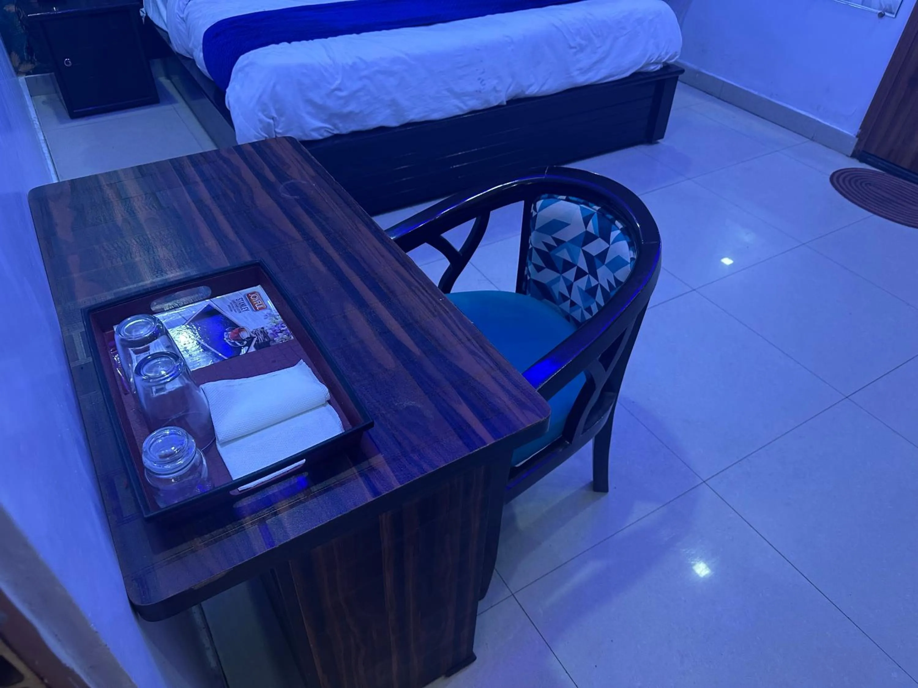 Bed in Blue Sky Hotels and Banquet