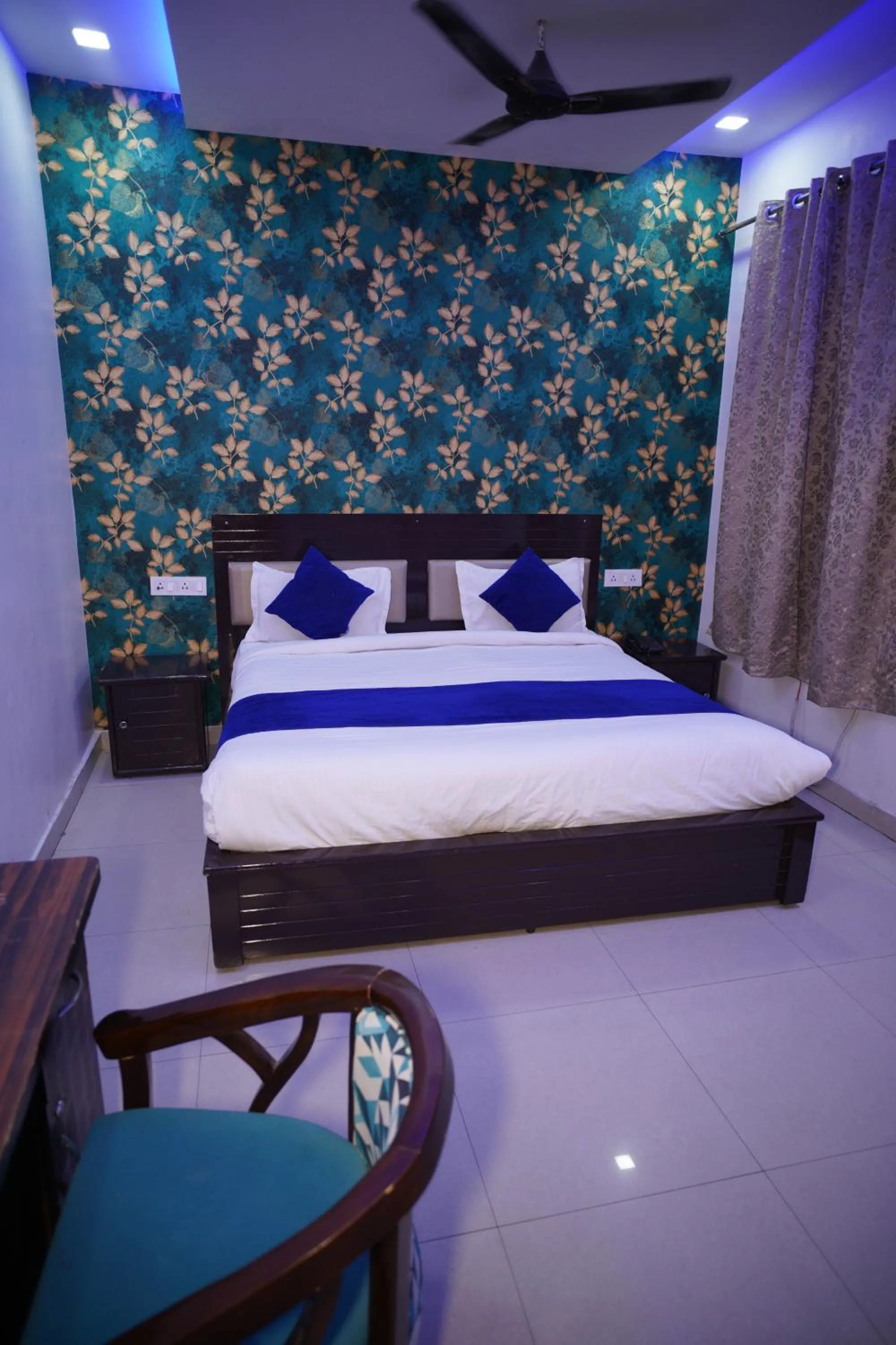 Bed in Blue Sky Hotels and Banquet
