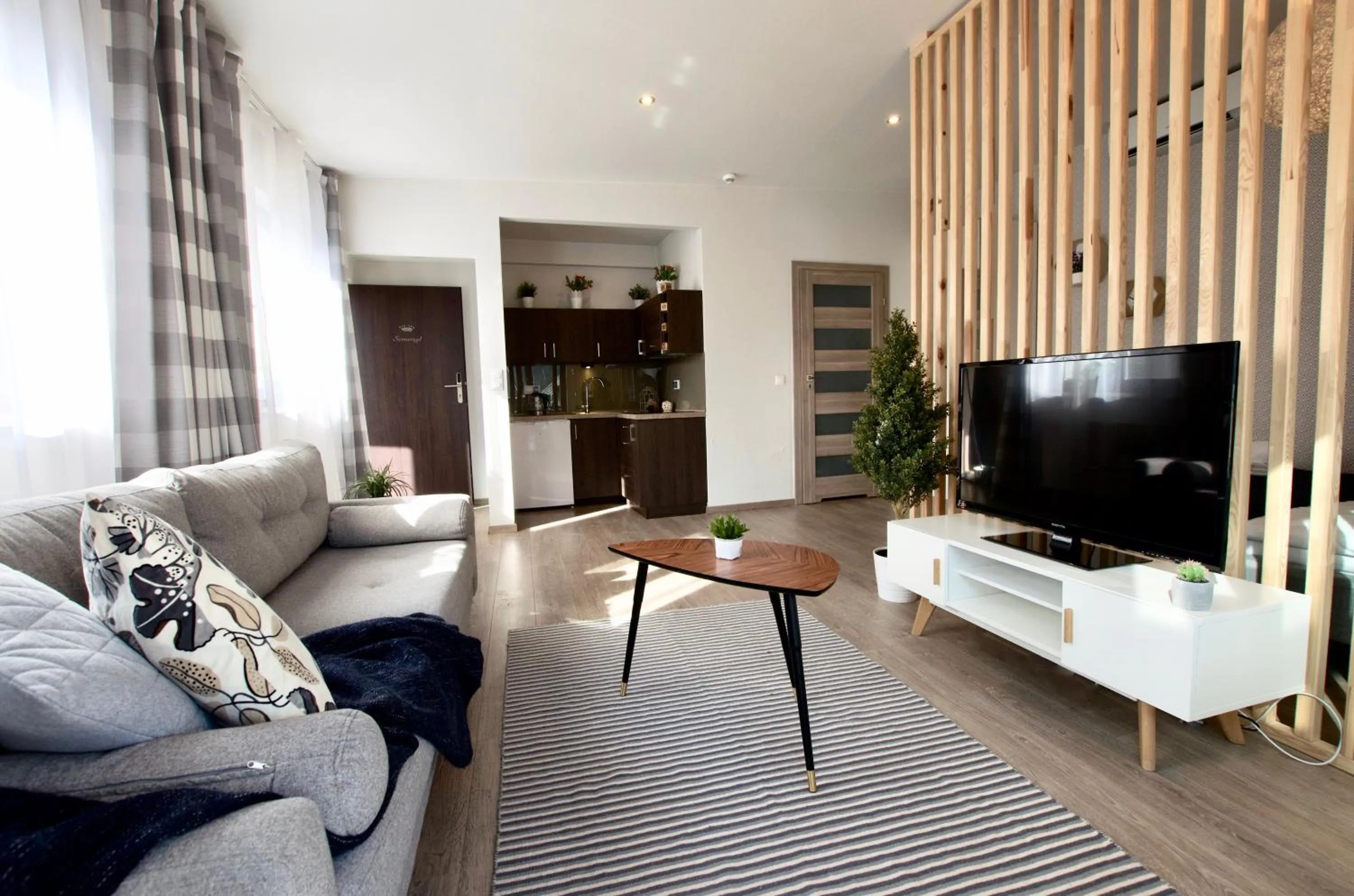 Communal lounge/ TV room in 7 Koron - Exclusive Apartments