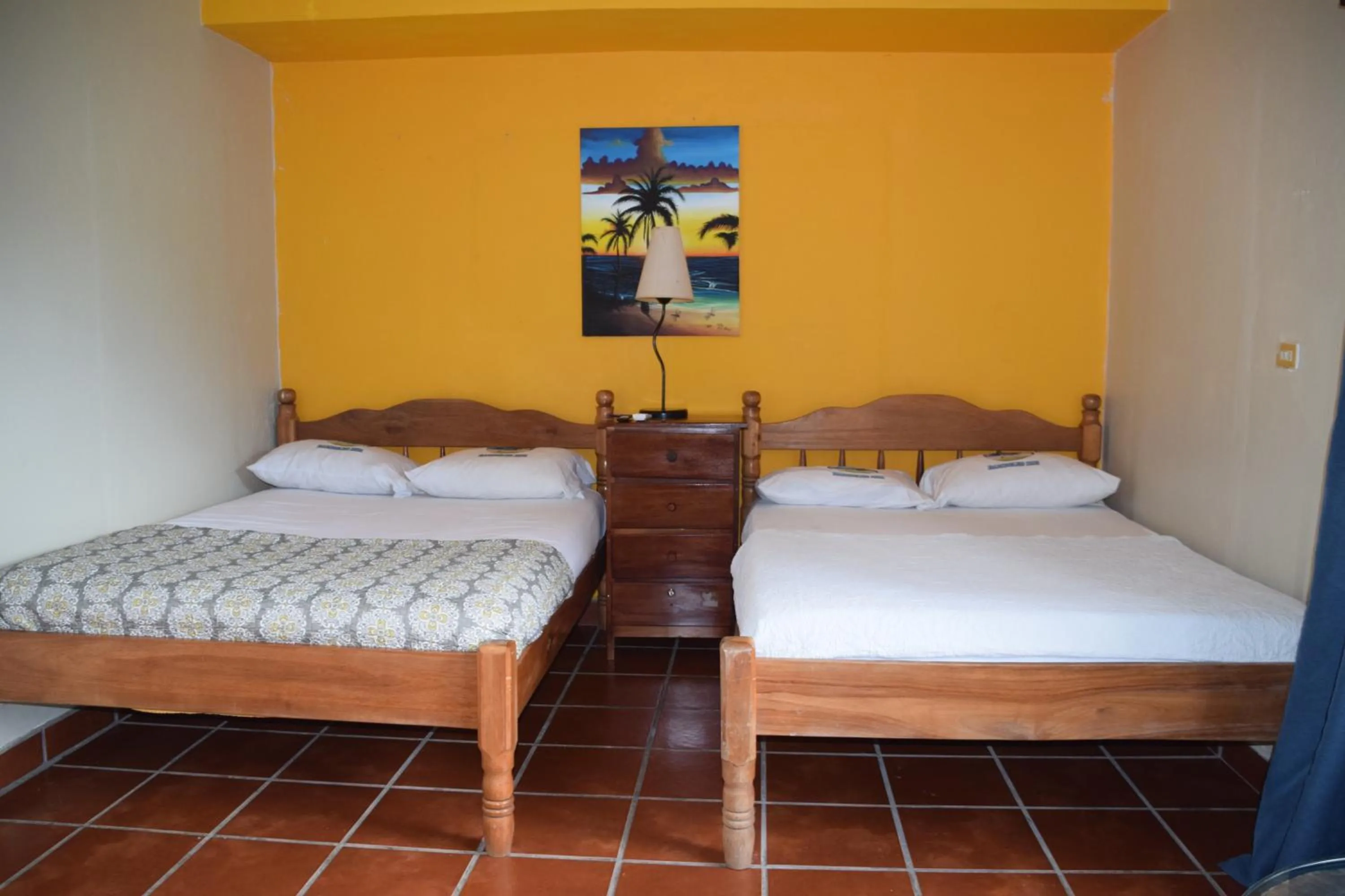 Bed in Bamboleo Inn