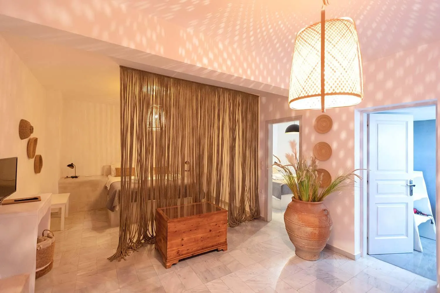 Bed in Phaos Santorini Suites