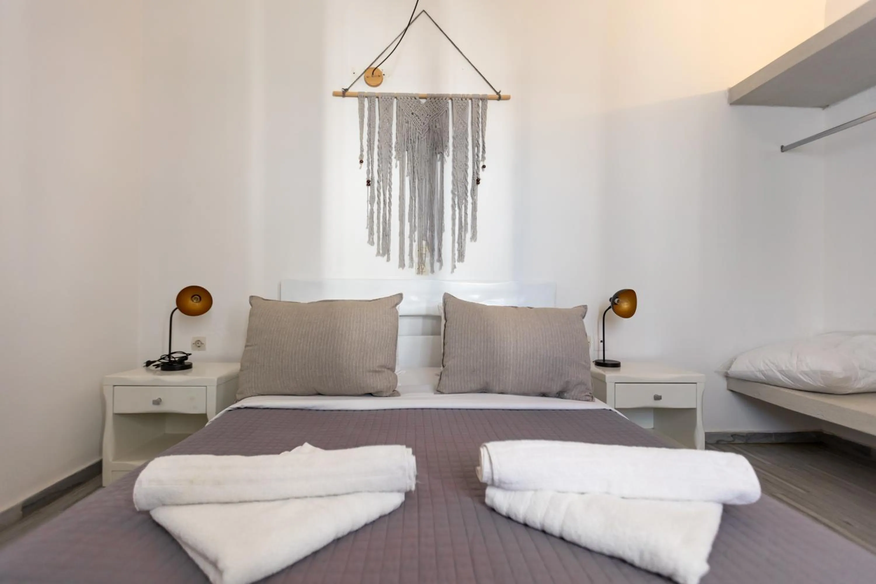 Bed in Phaos Santorini Suites