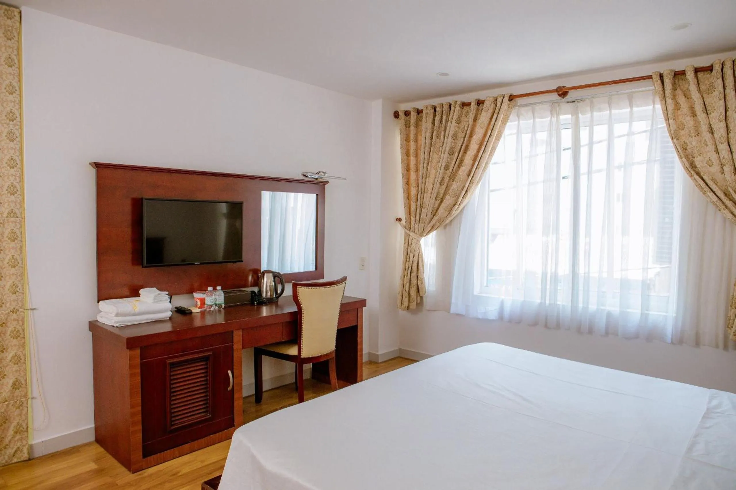 Photo of the whole room, Bed in Lanxy Hotel Nha Trang