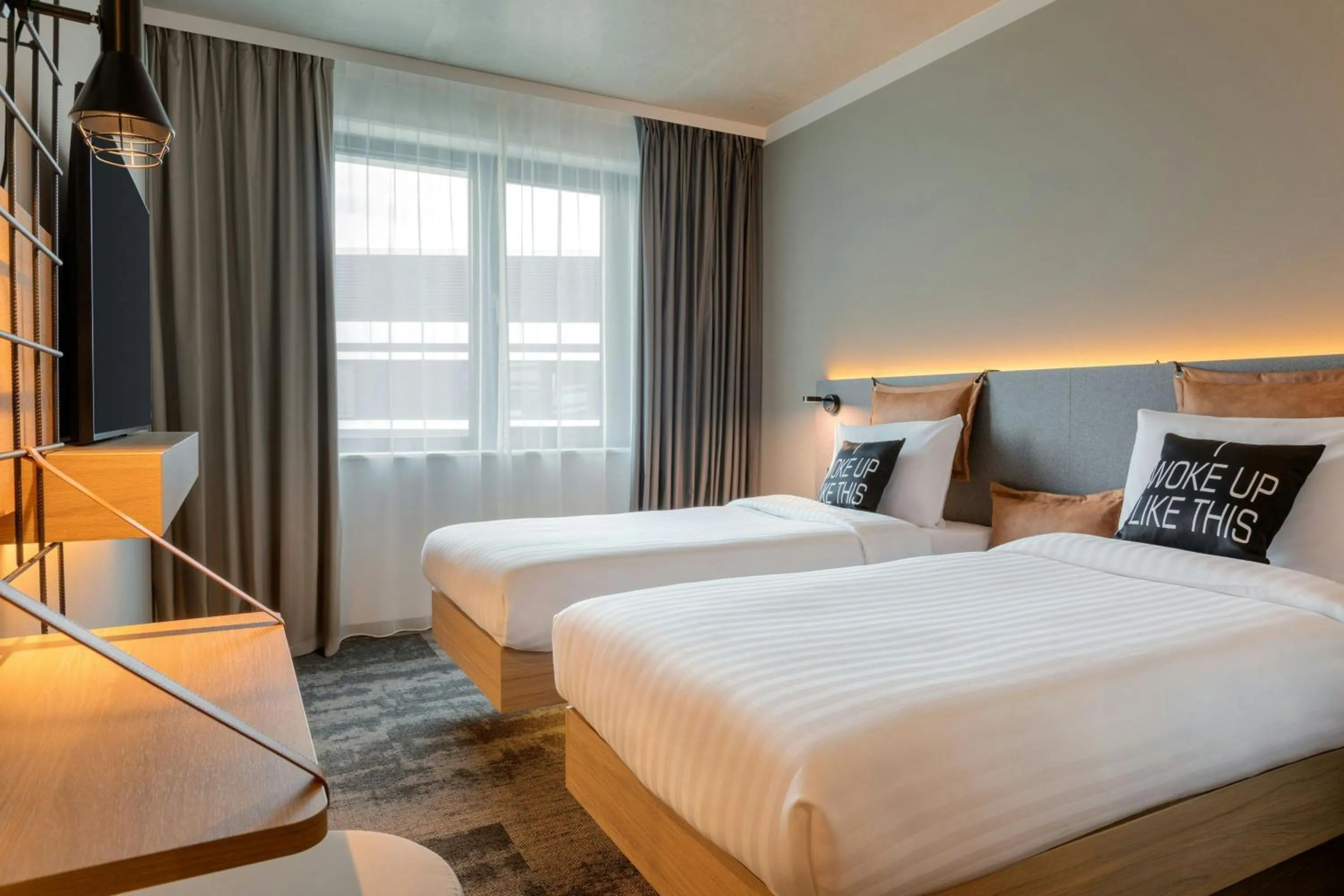 Photo of the whole room, Bed in Moxy Hamburg - Finkenwerder