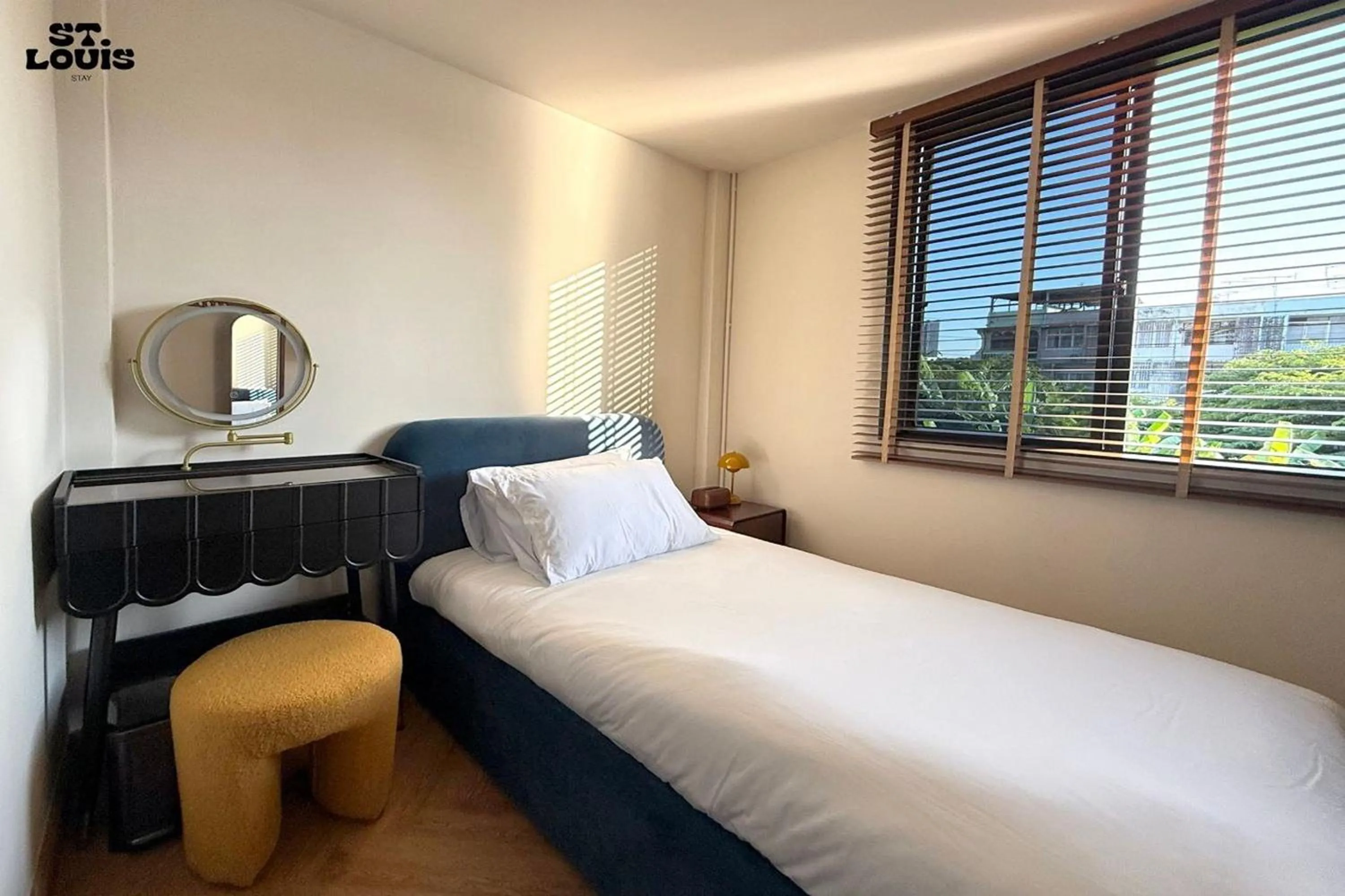 Bed in Saint Louis Stay