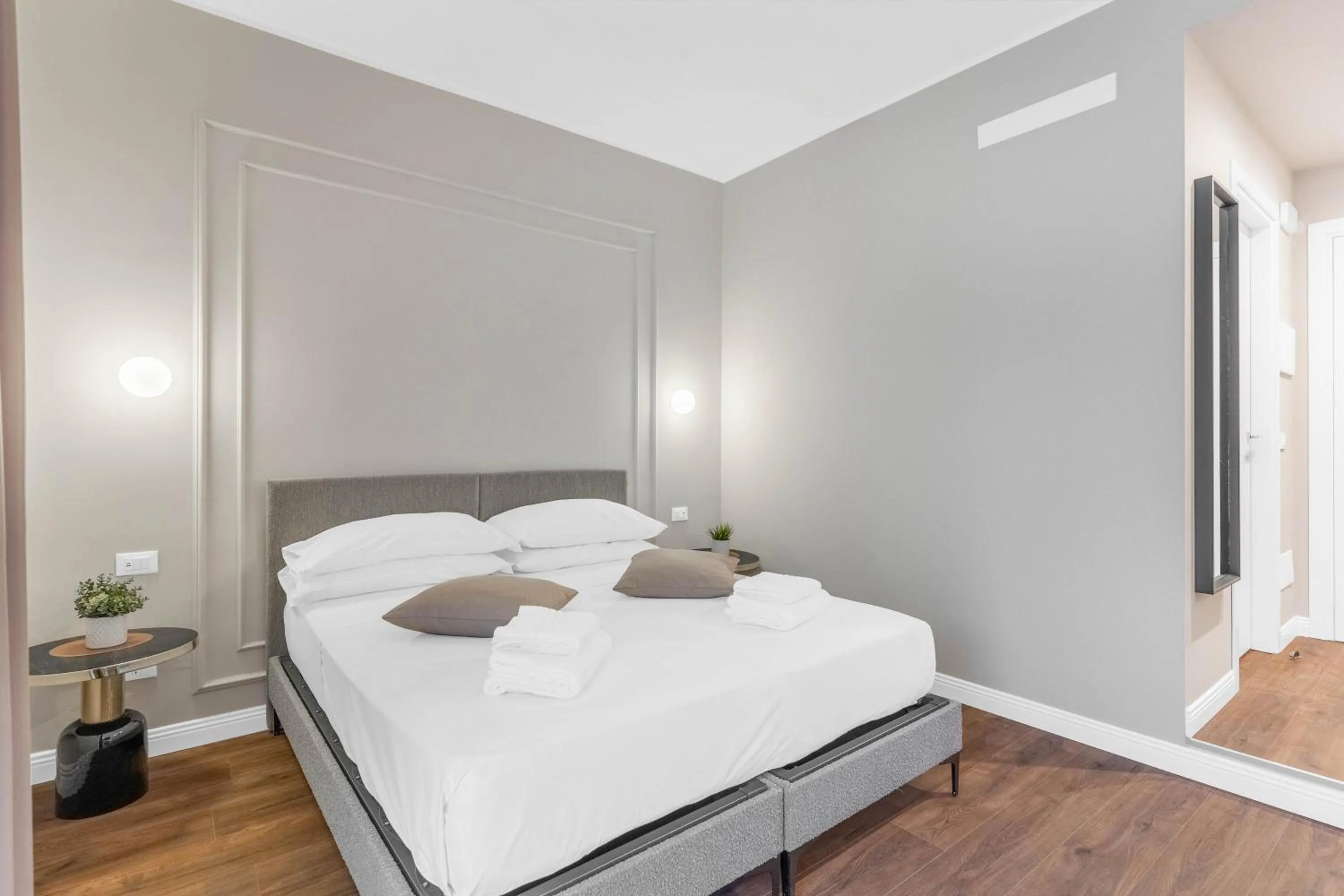 Bed in Torriani Suites Foresteria Lombarda