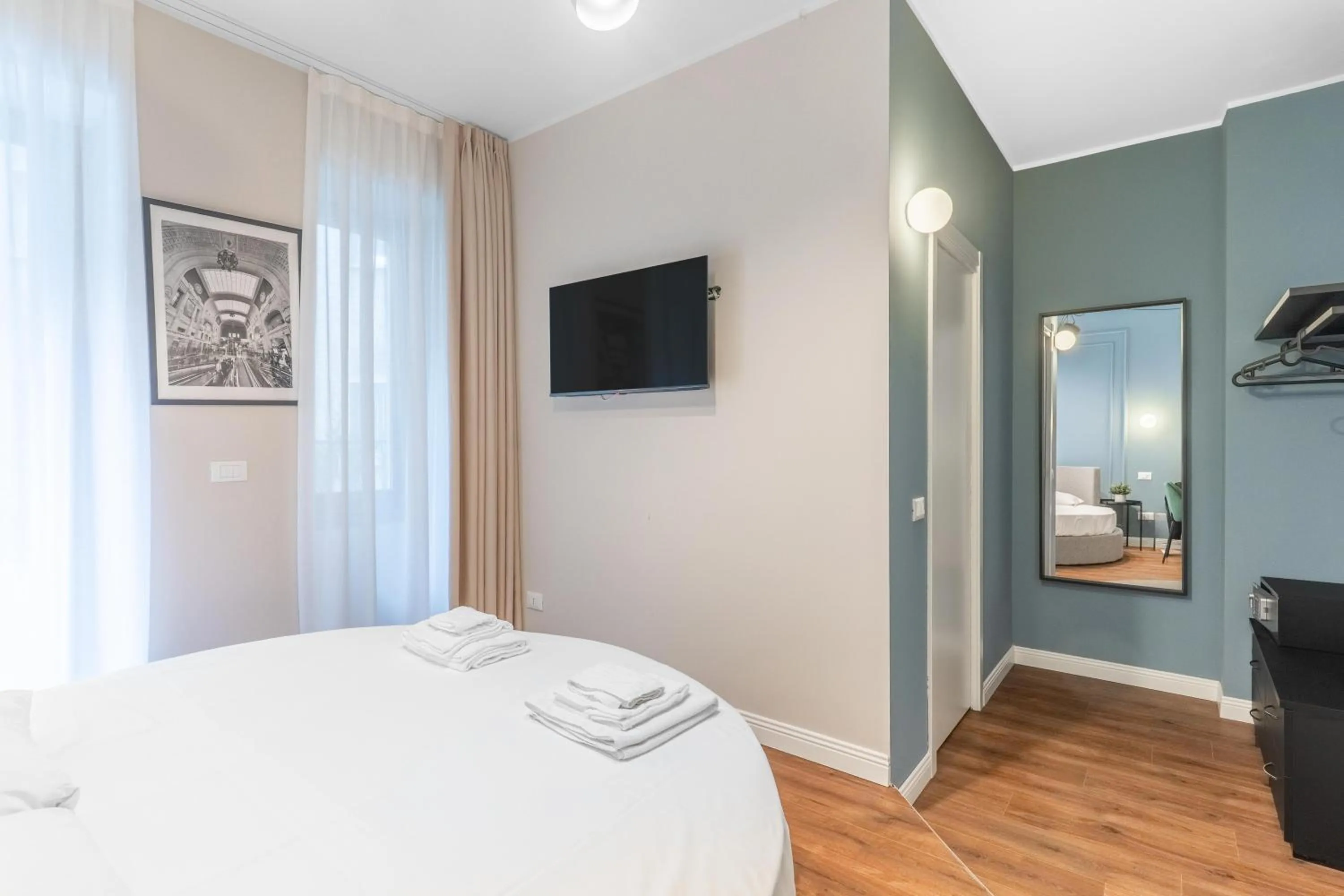 Bed in Torriani Suites Foresteria Lombarda