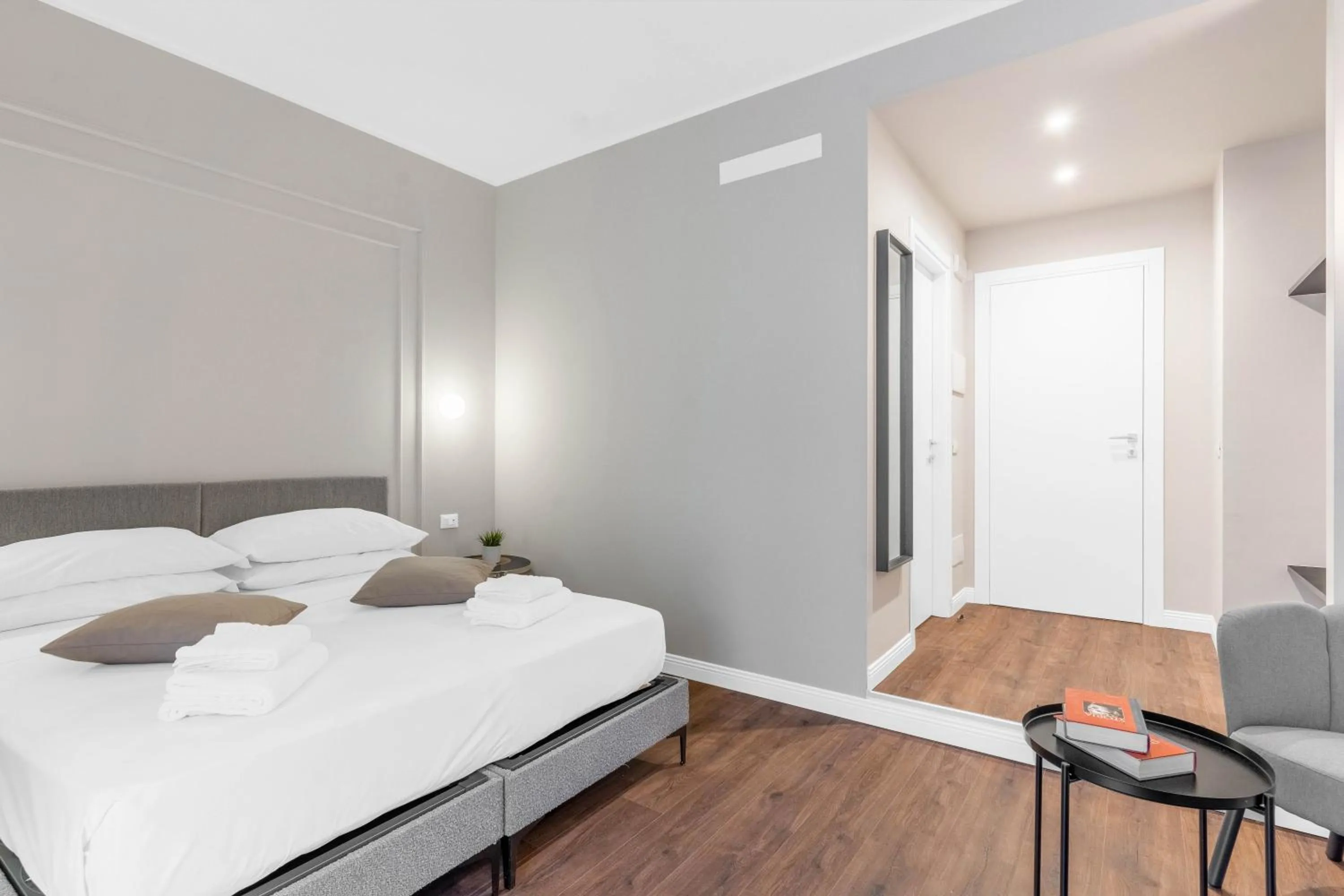 Bed in Torriani Suites Foresteria Lombarda