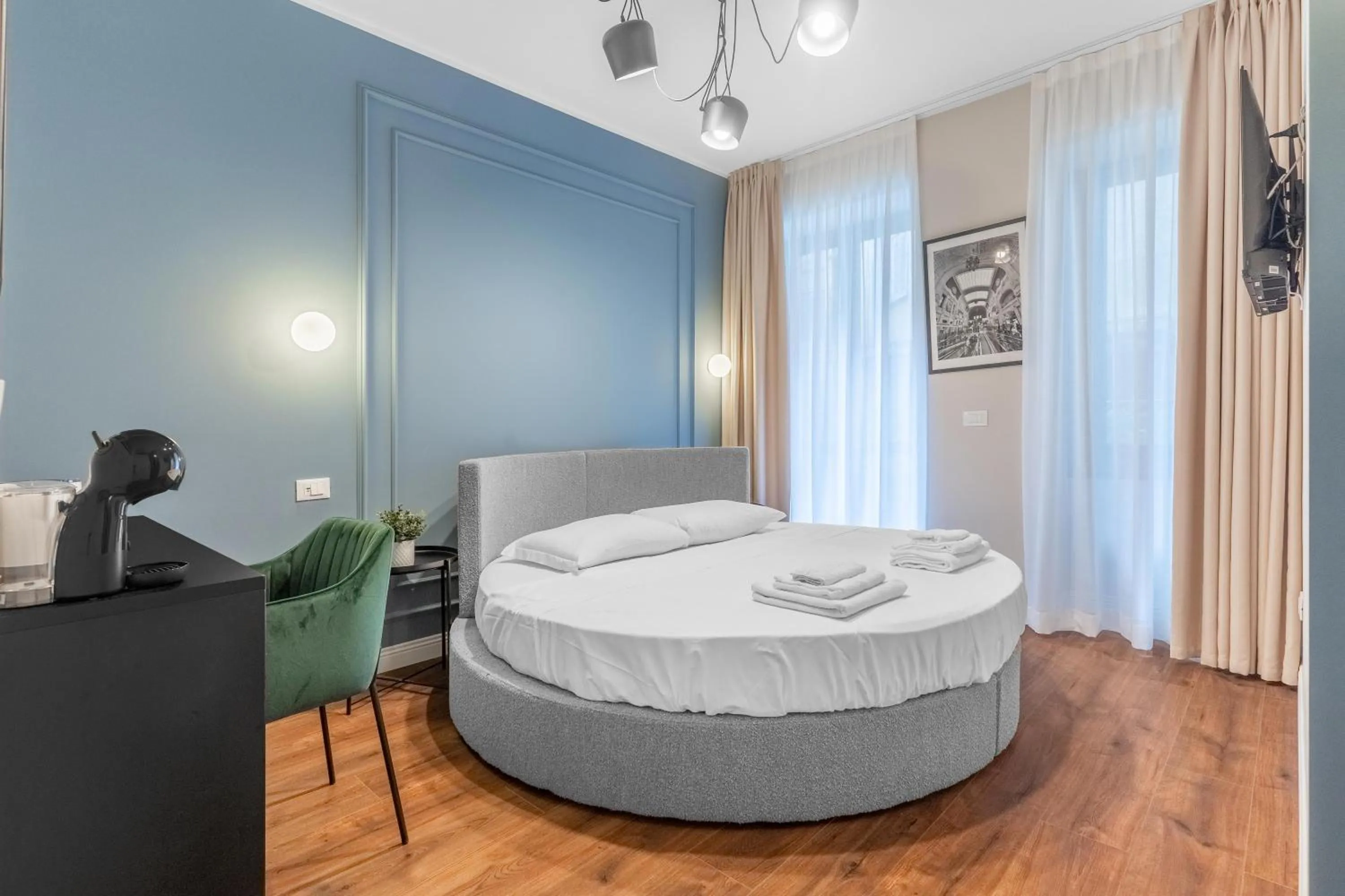 Bed in Torriani Suites Foresteria Lombarda