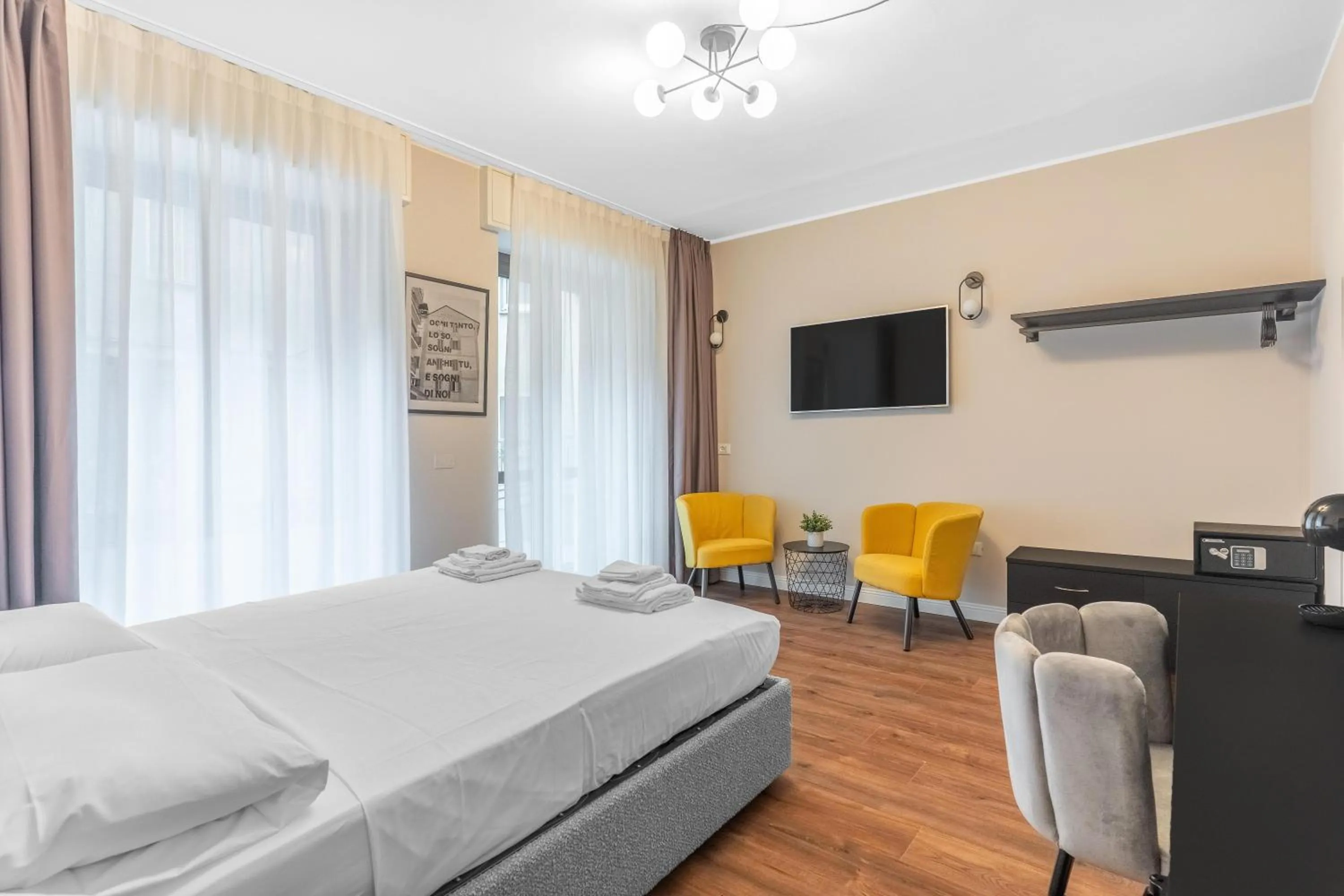 Bed in Torriani Suites Foresteria Lombarda