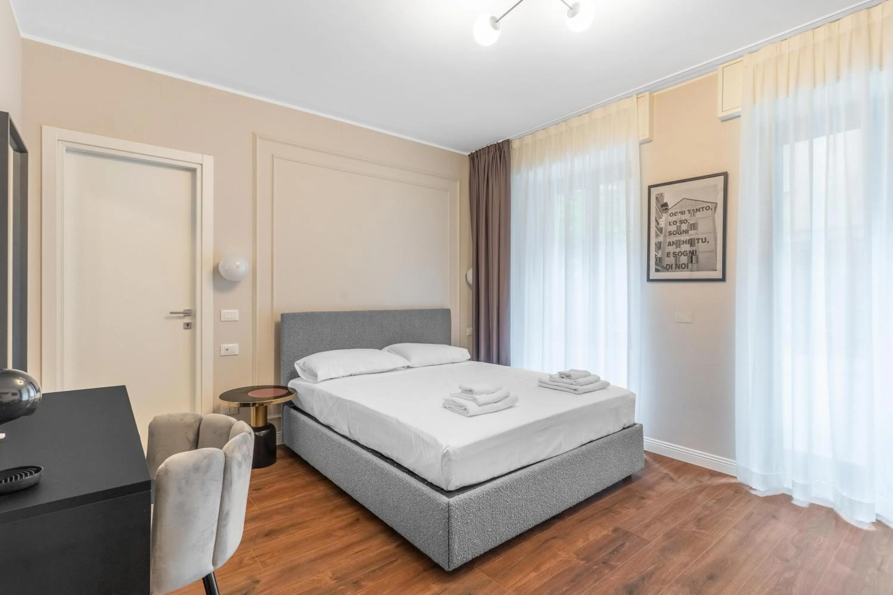 Bed in Torriani Suites Foresteria Lombarda