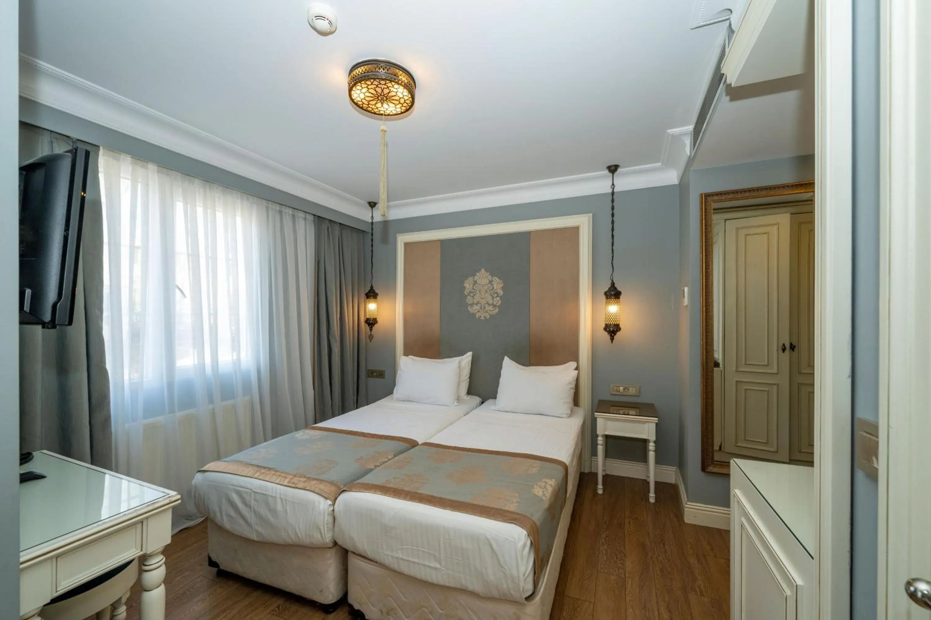 Bedroom in Raymond Blue Hotel