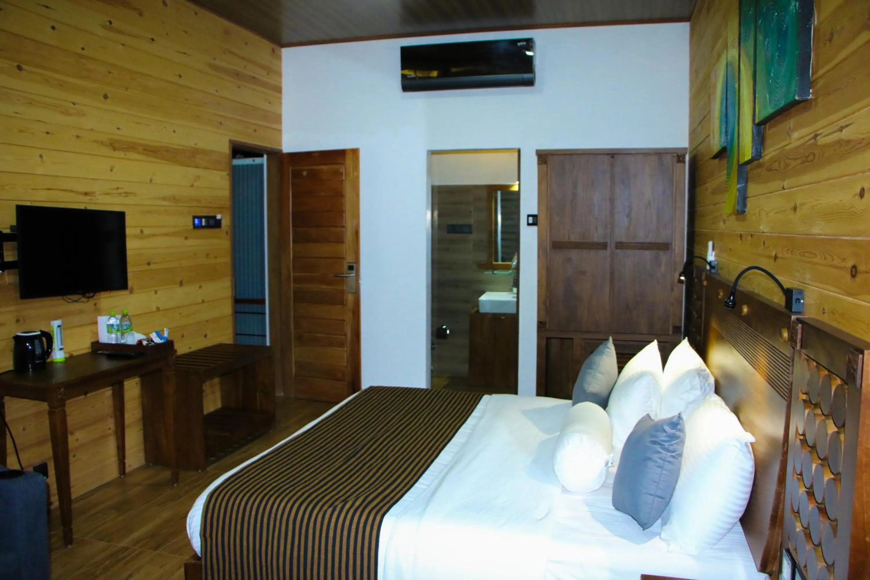 Bed in EllaCrest by Aloft