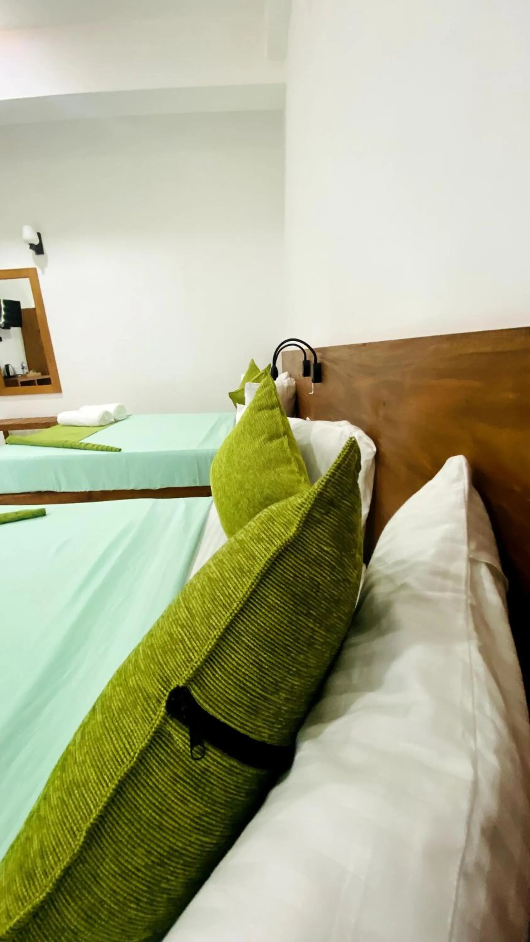 Bed in EllaCrest by Aloft