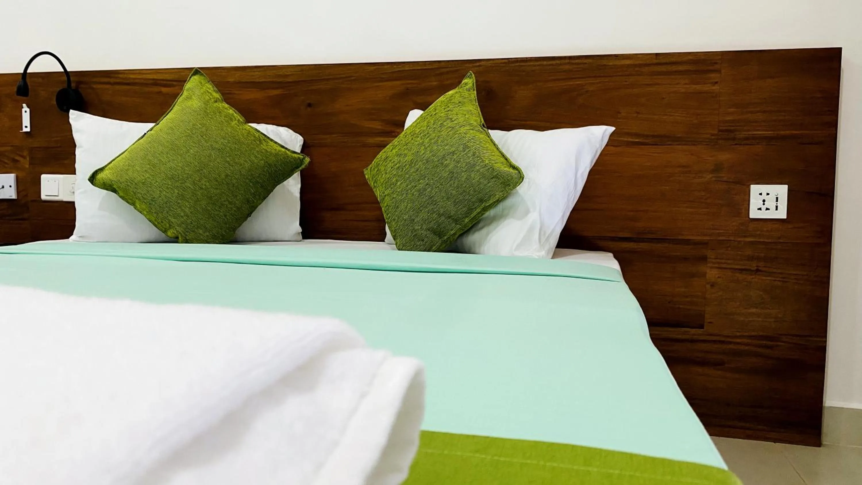 Bed in EllaCrest by Aloft