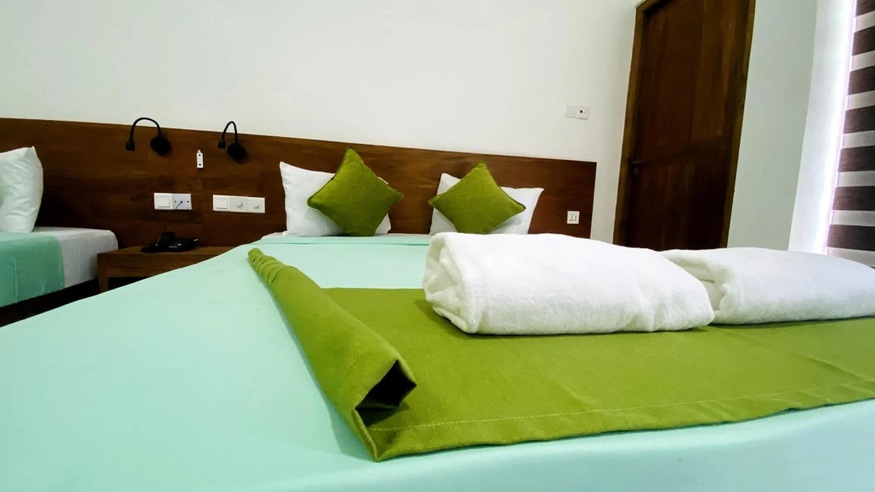 Bed in EllaCrest by Aloft