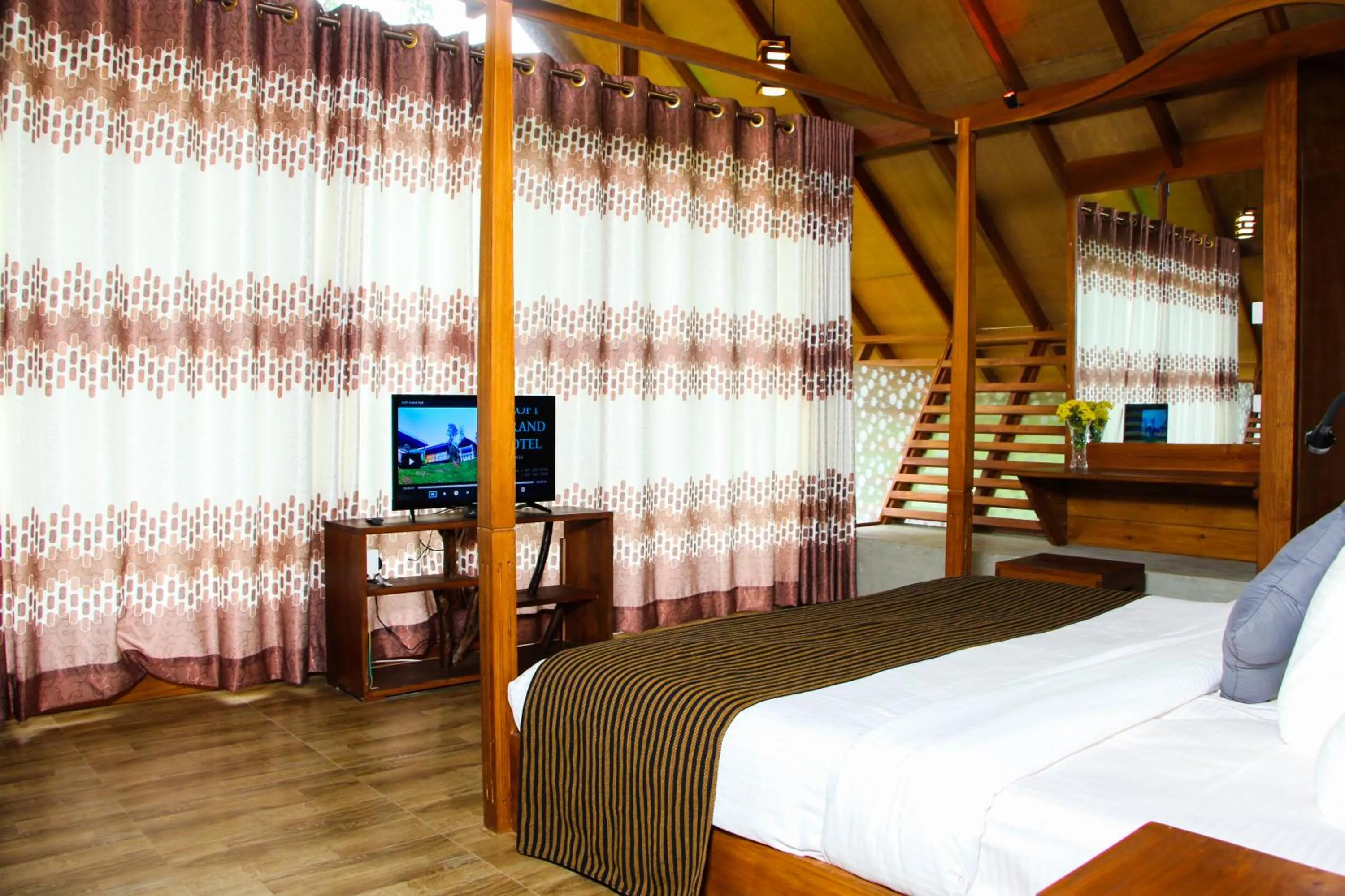 Bed in EllaCrest by Aloft