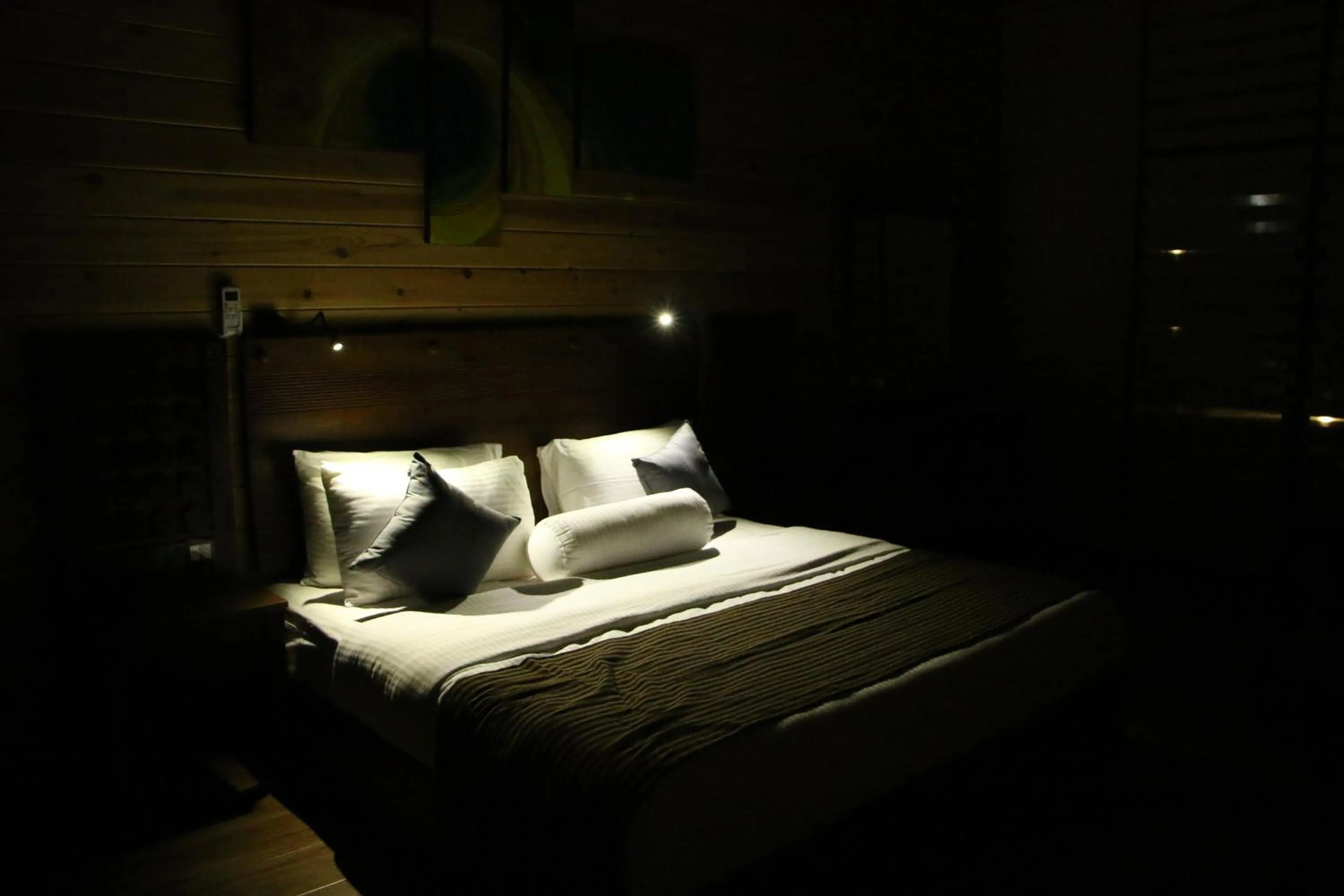 Bed in EllaCrest by Aloft