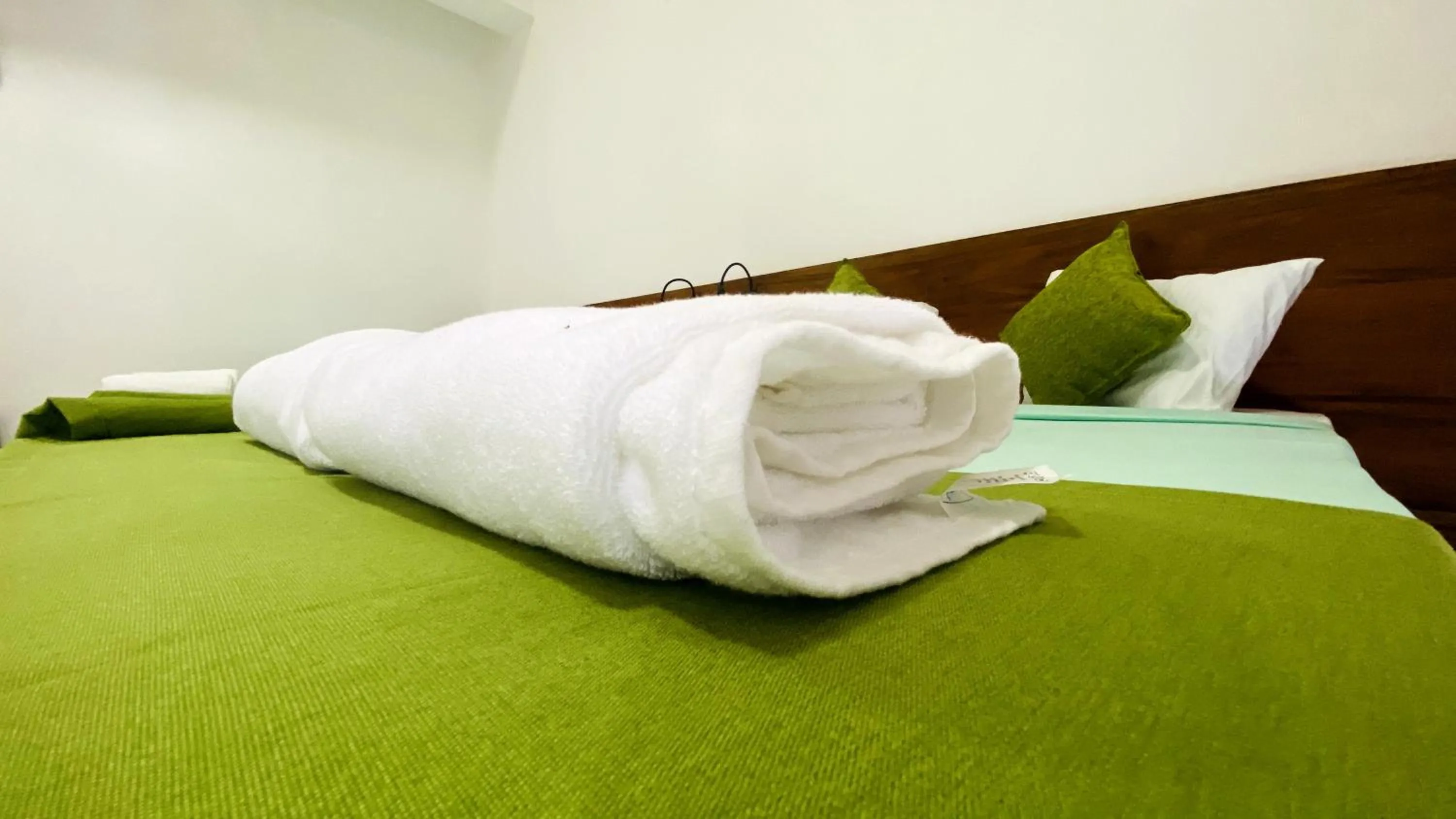 Bed in EllaCrest by Aloft