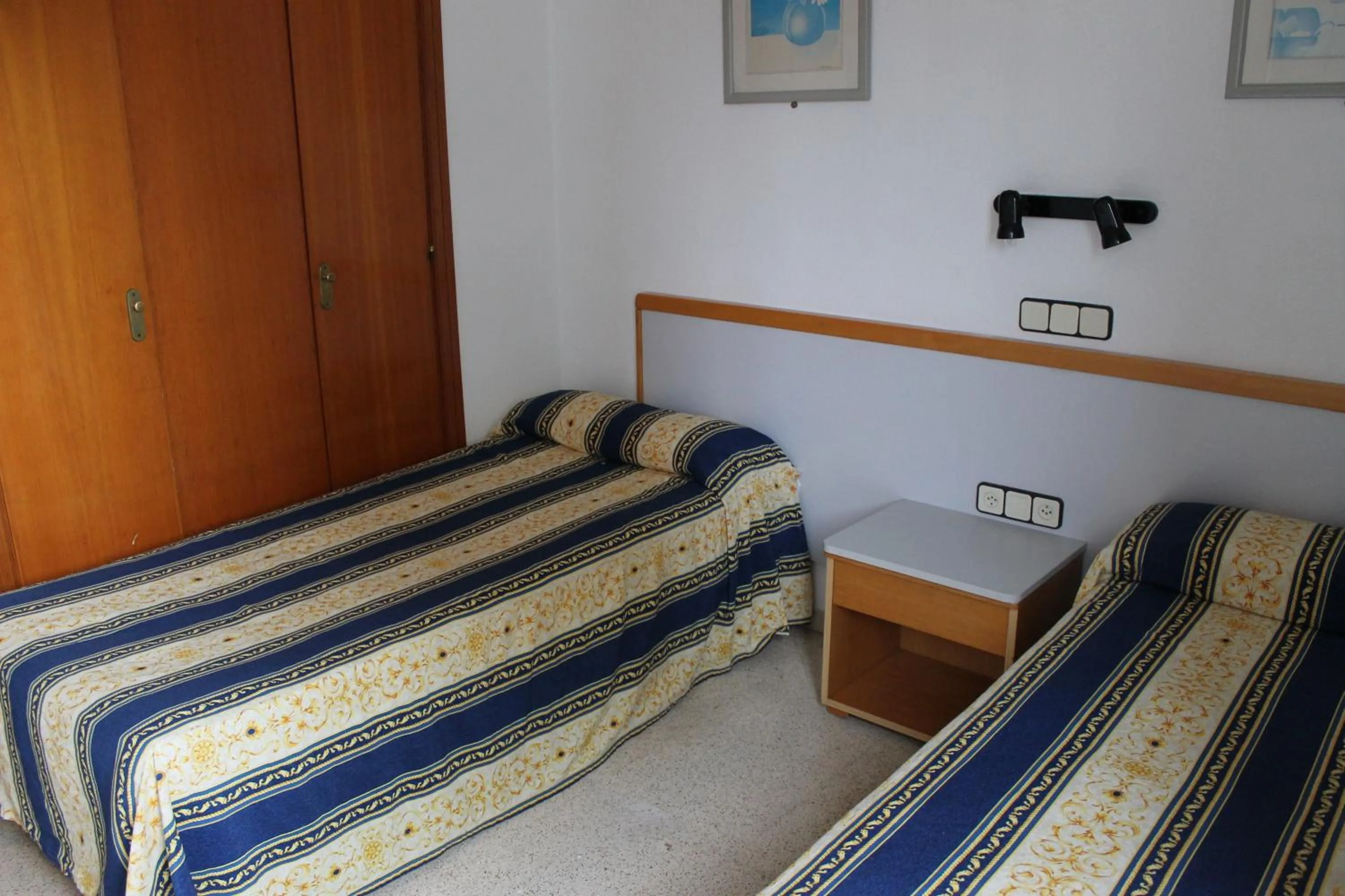 Bed in Apartamentos Alpha