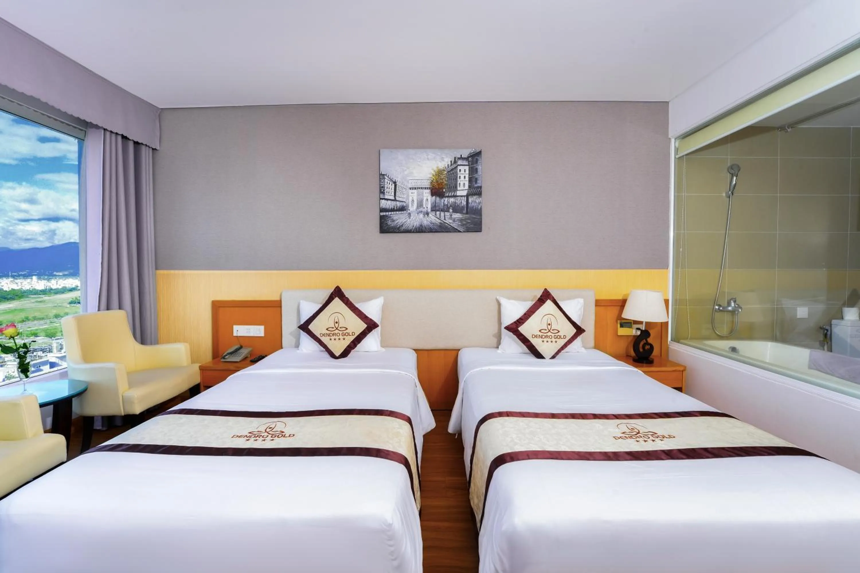 Bed in Dendro Gold Hotel