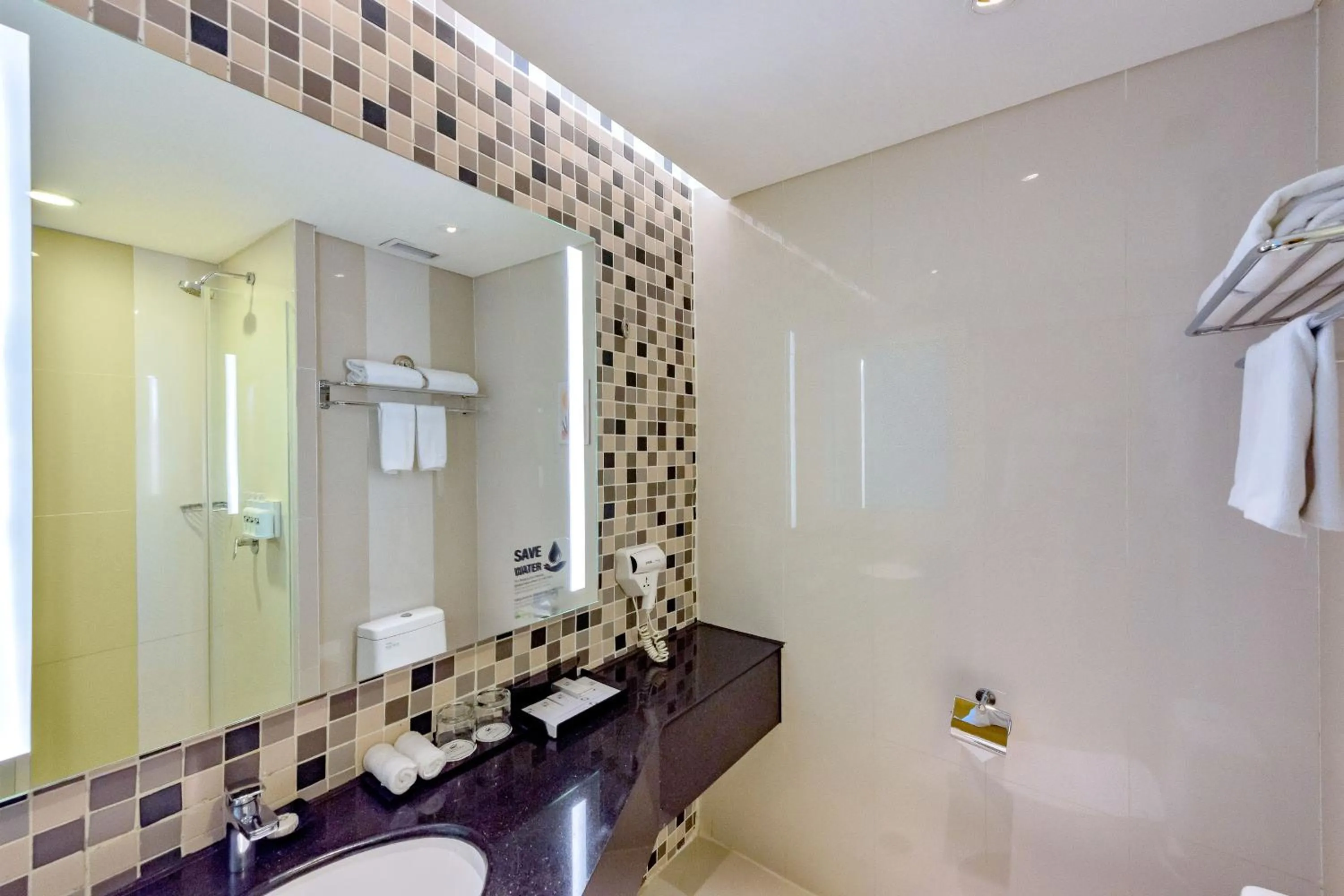 Bathroom in Hotel Ciputra Cibubur managed by Swiss-Belhotel International