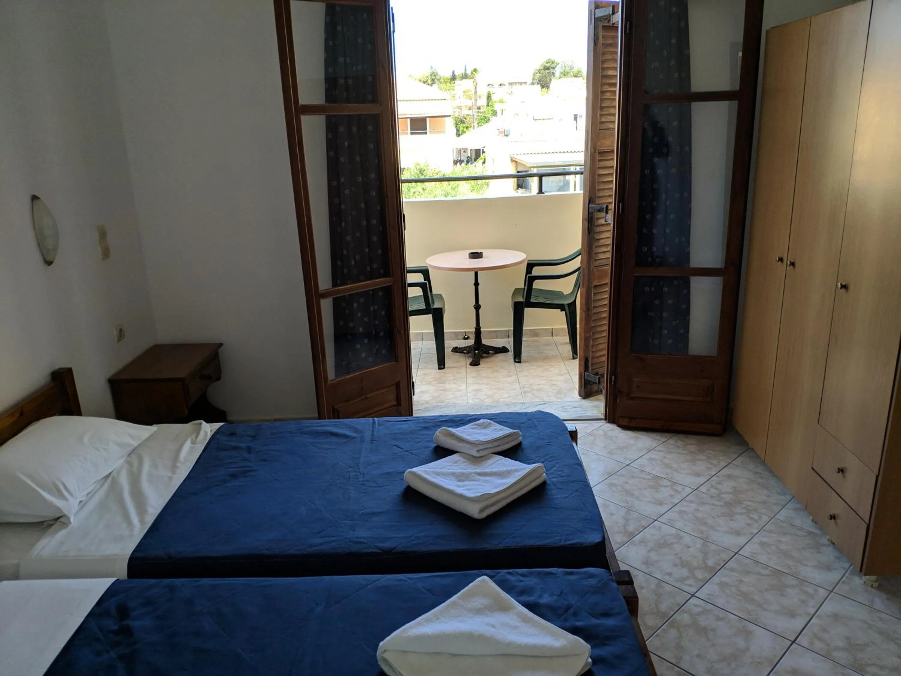 Bed in Tondoris Apartments