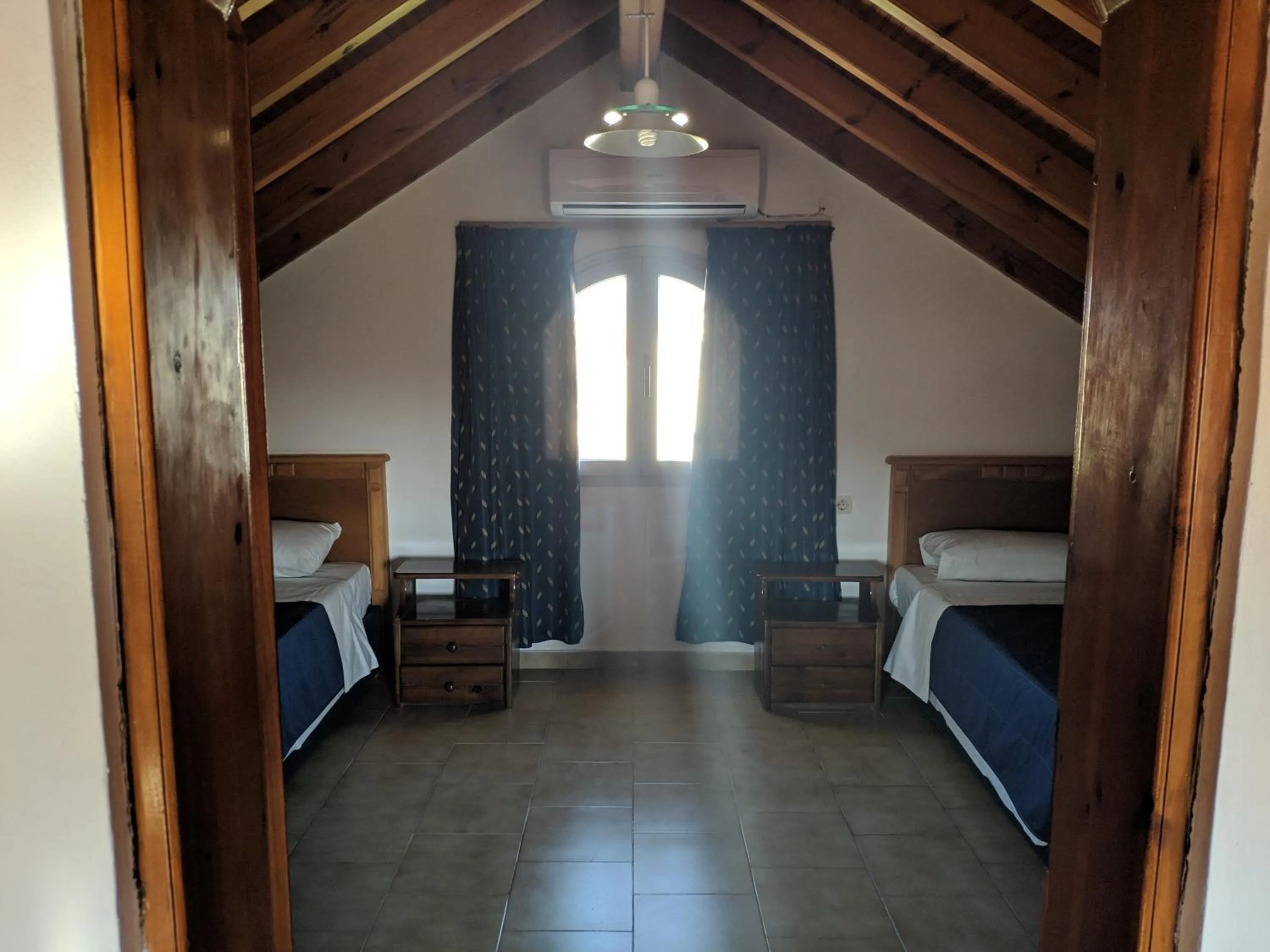 Bed in Tondoris Apartments