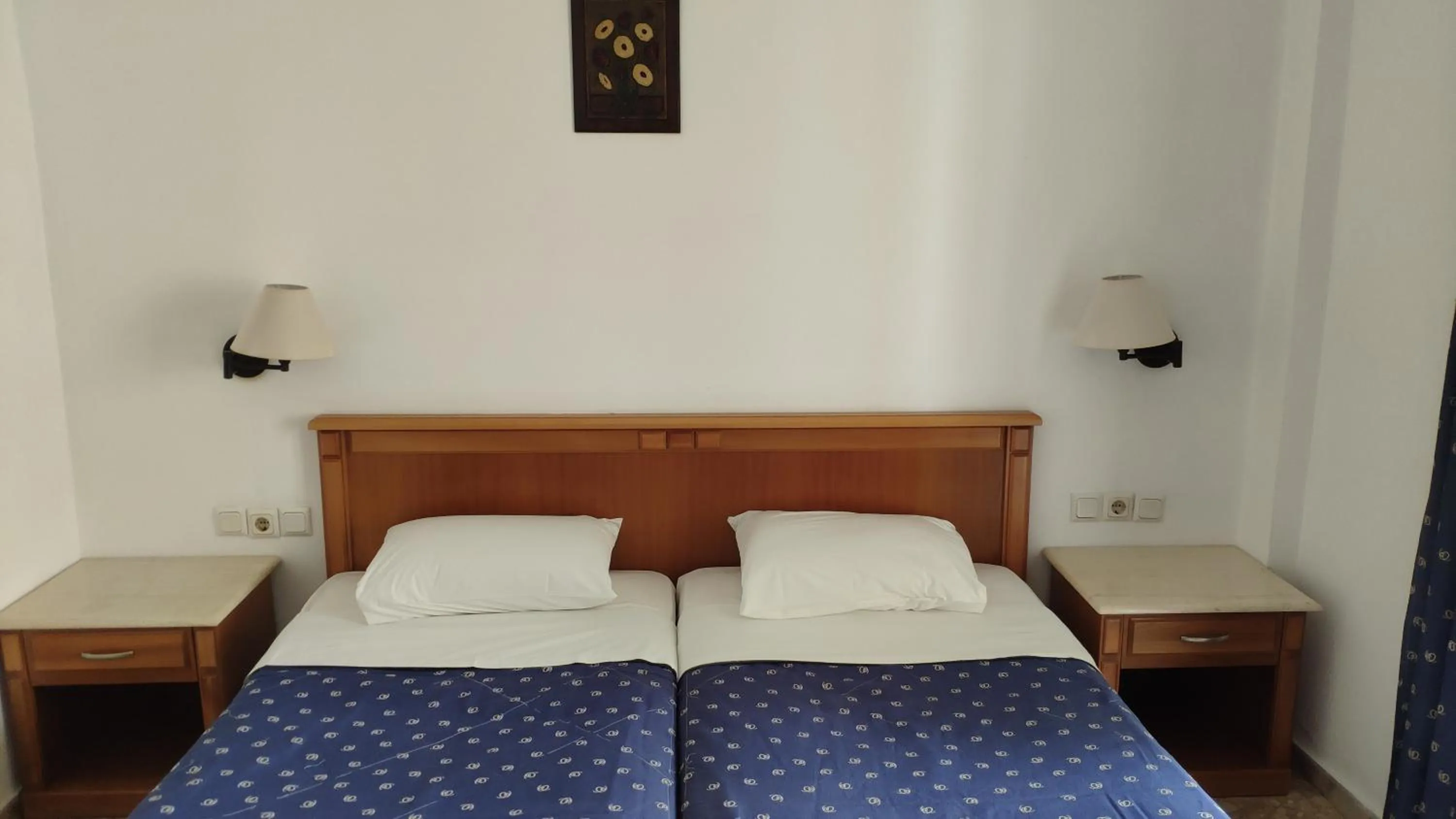 Bed in Tondoris Apartments