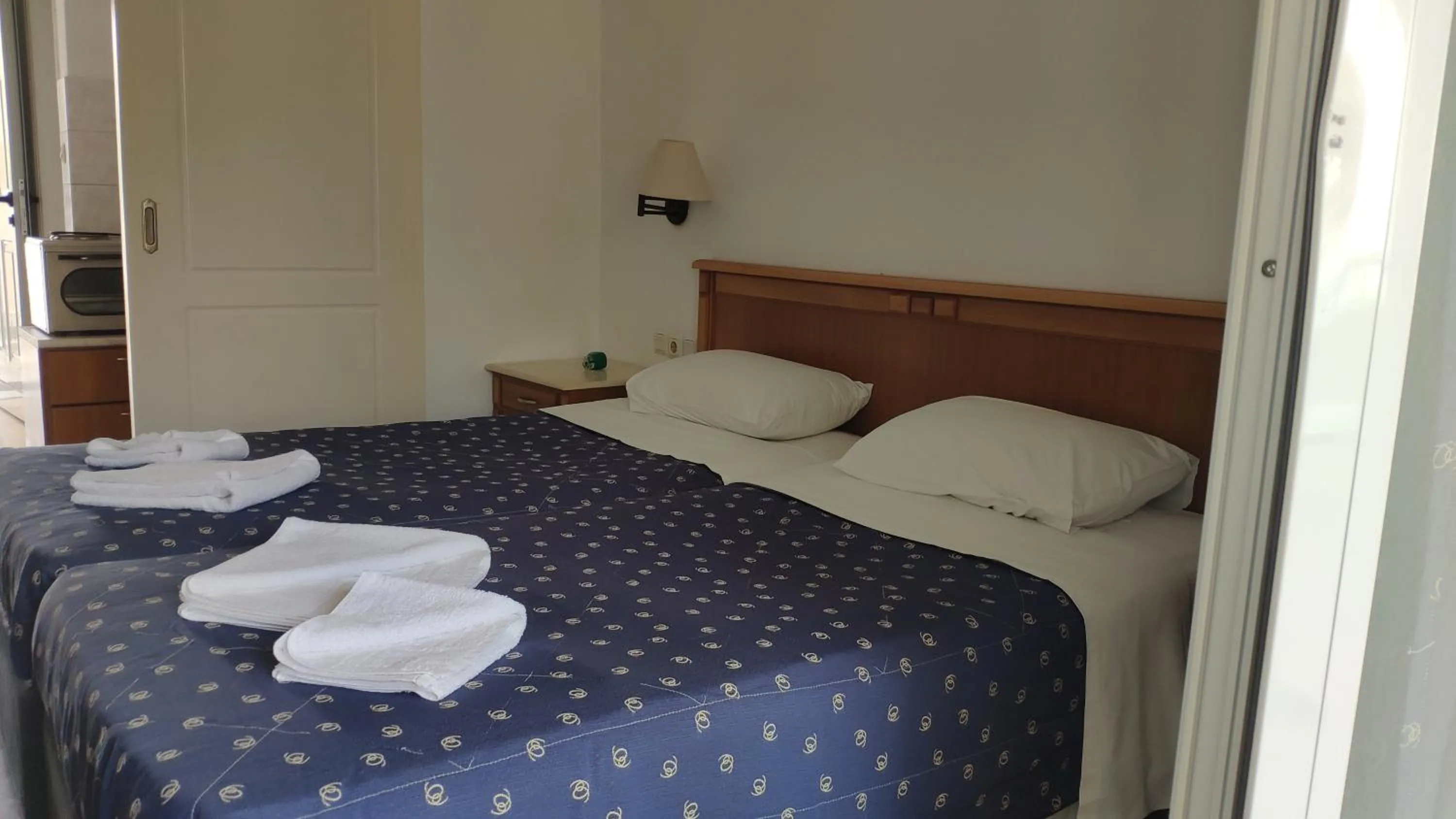 Bed in Tondoris Apartments