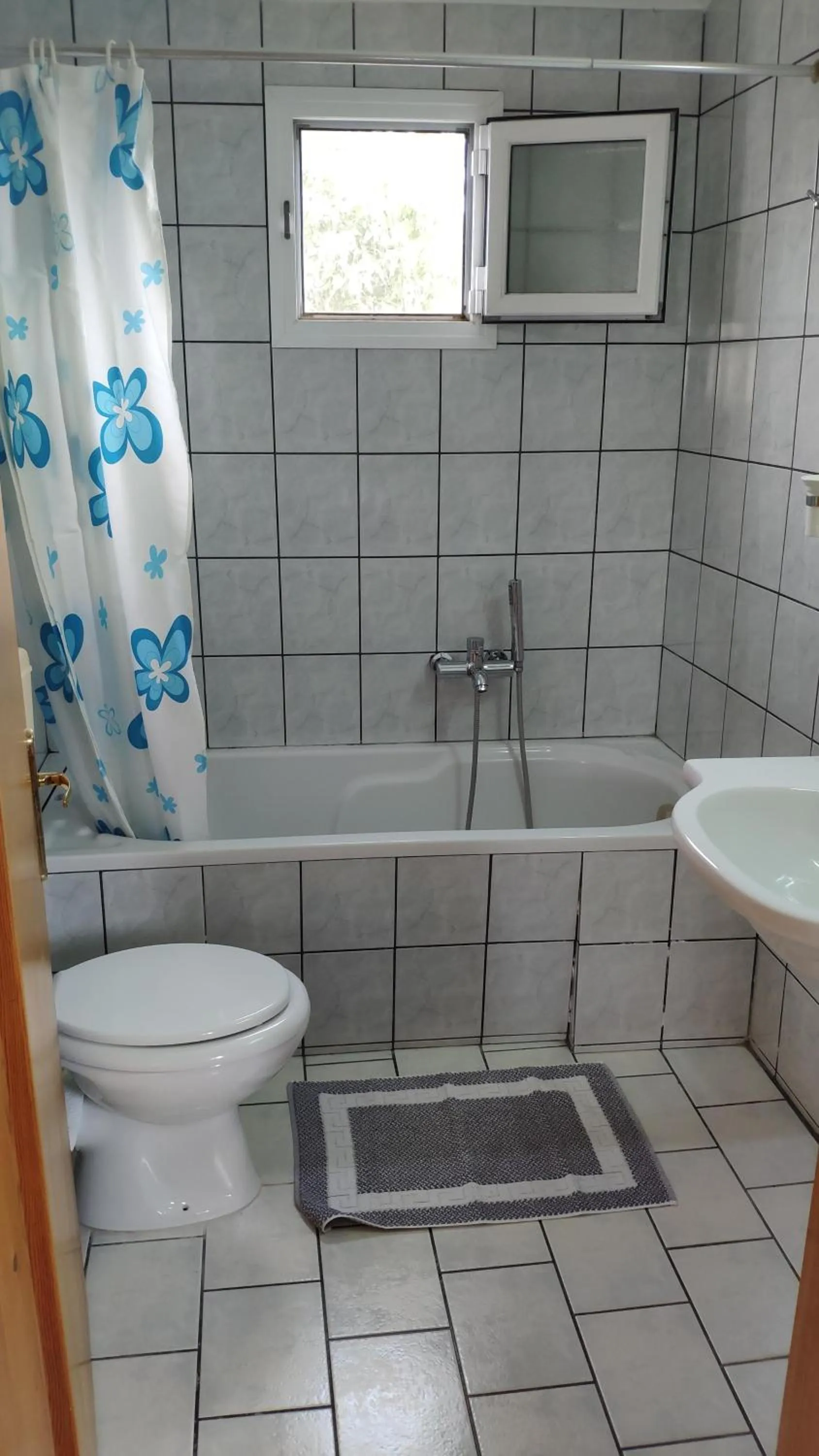 Toilet in Tondoris Apartments