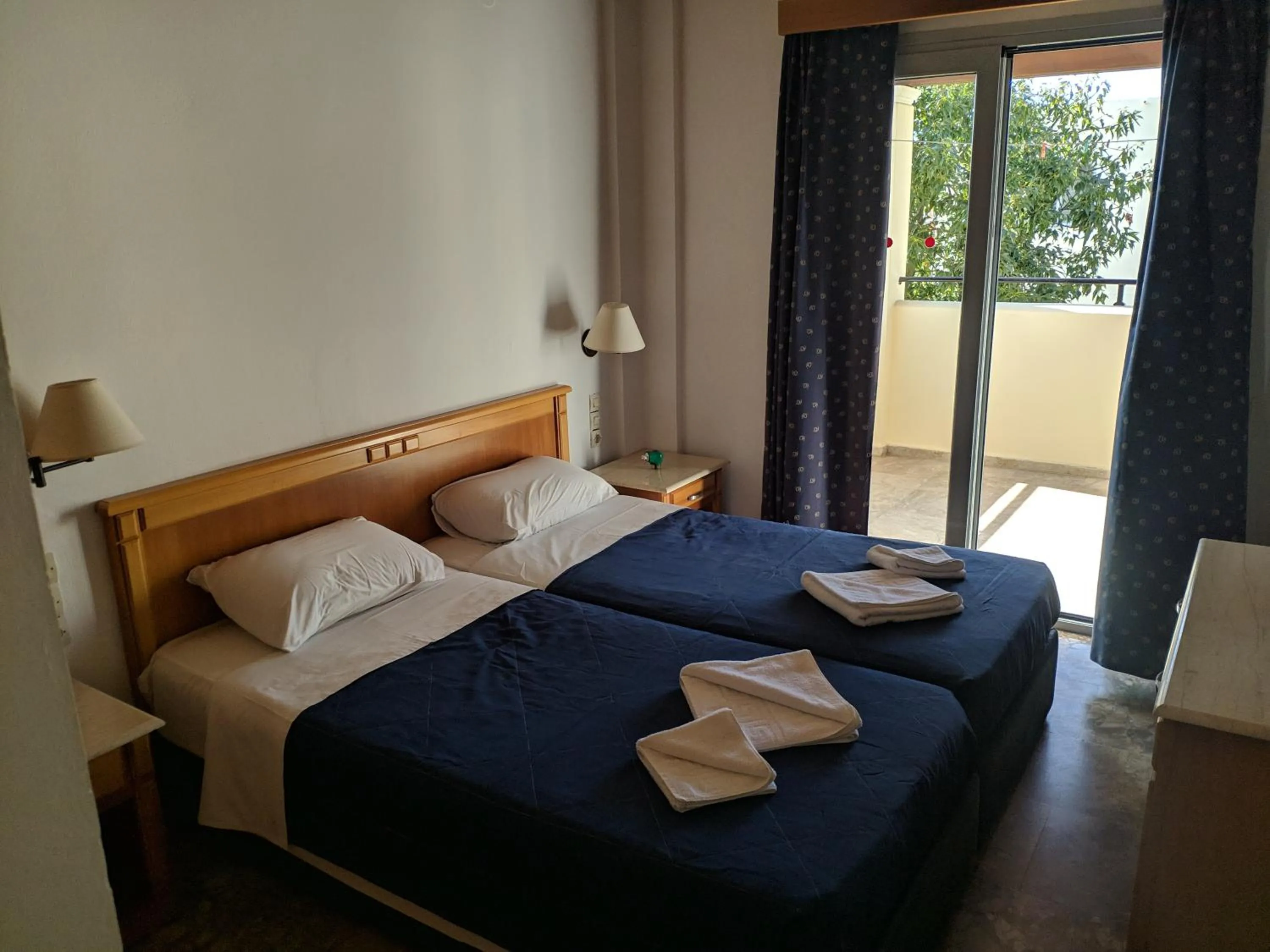 Bed in Tondoris Apartments