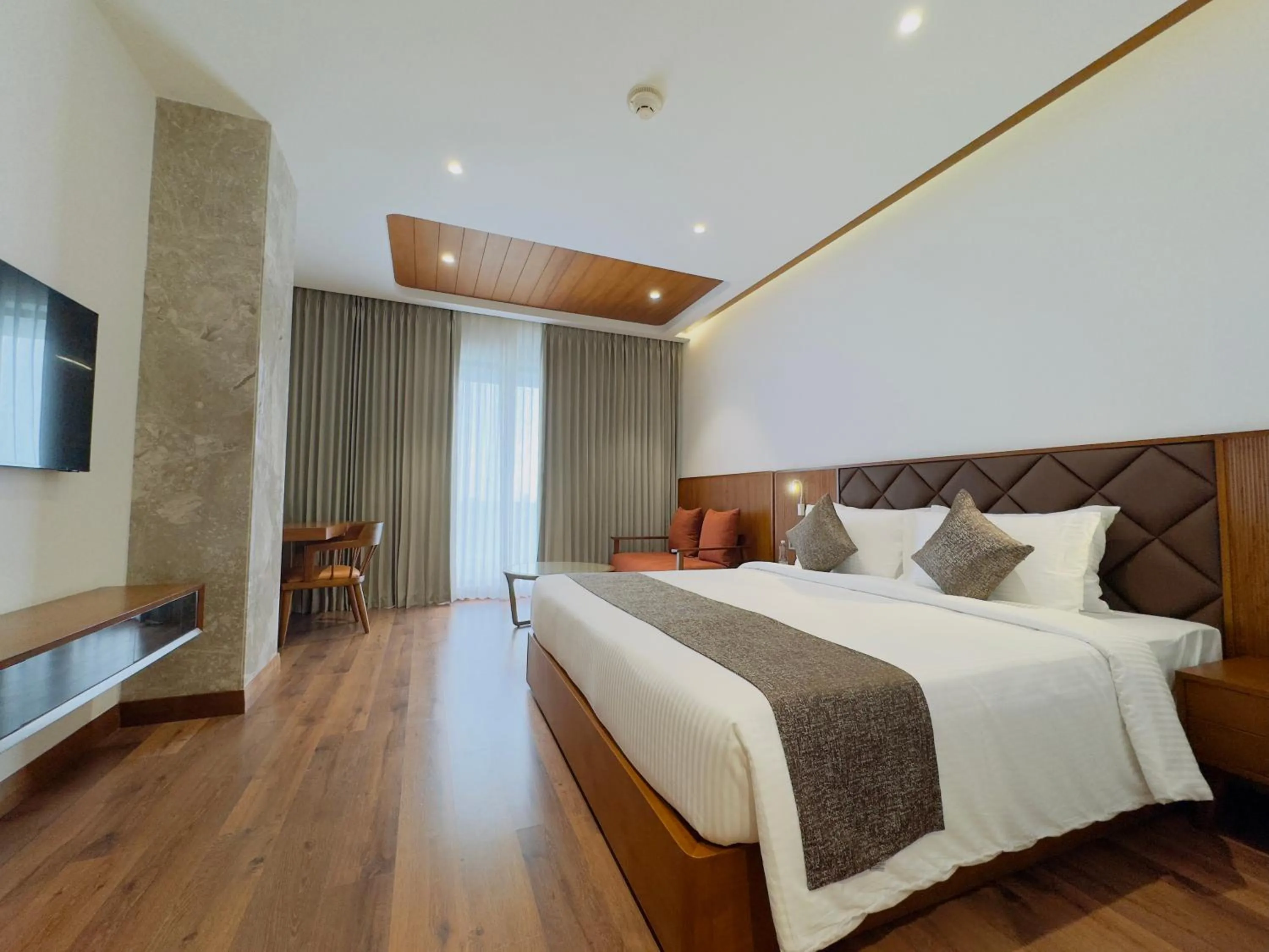 Bed in Gokulam Grand Kozhikode