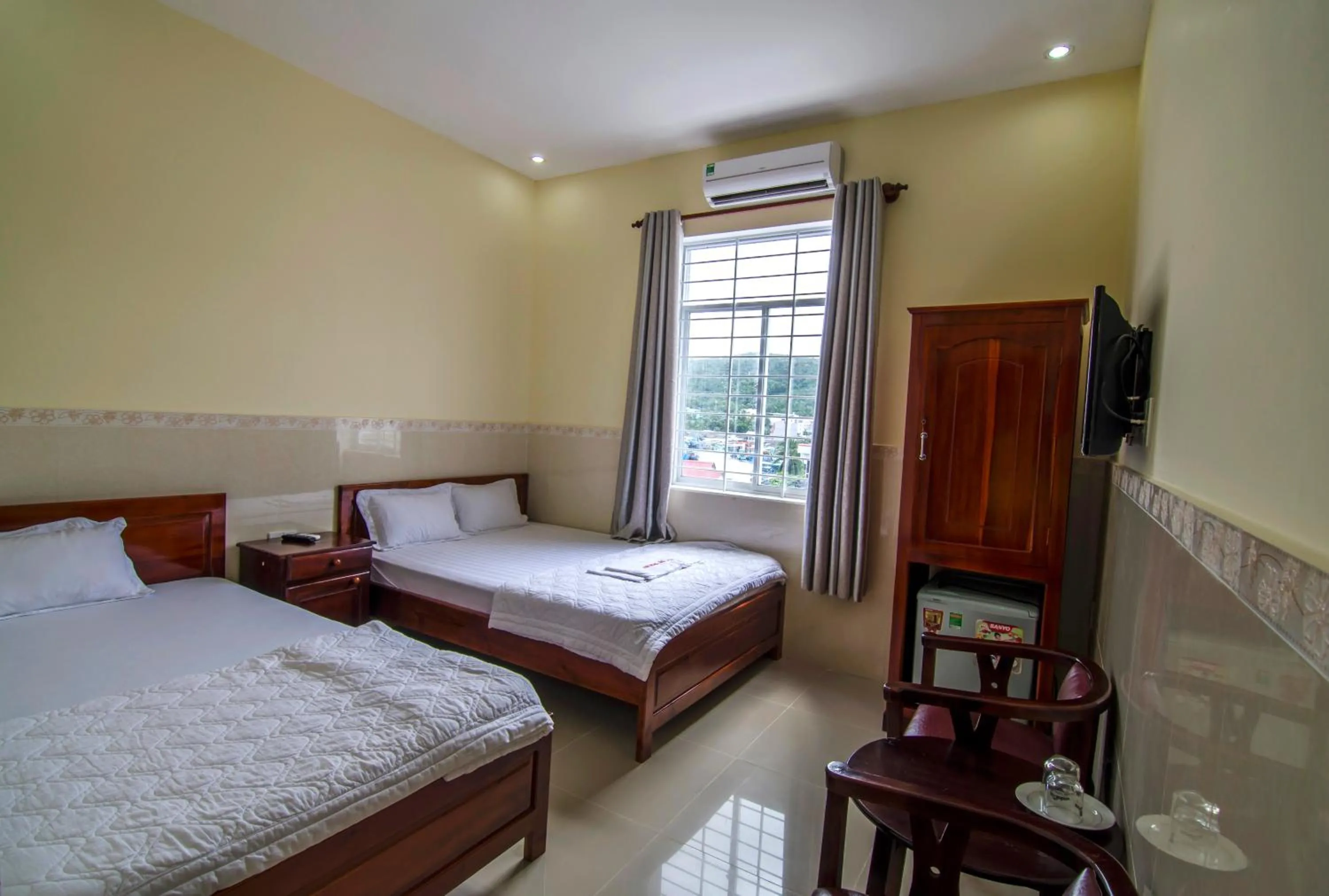 Bed in Kim Hồng Nhật Guest House